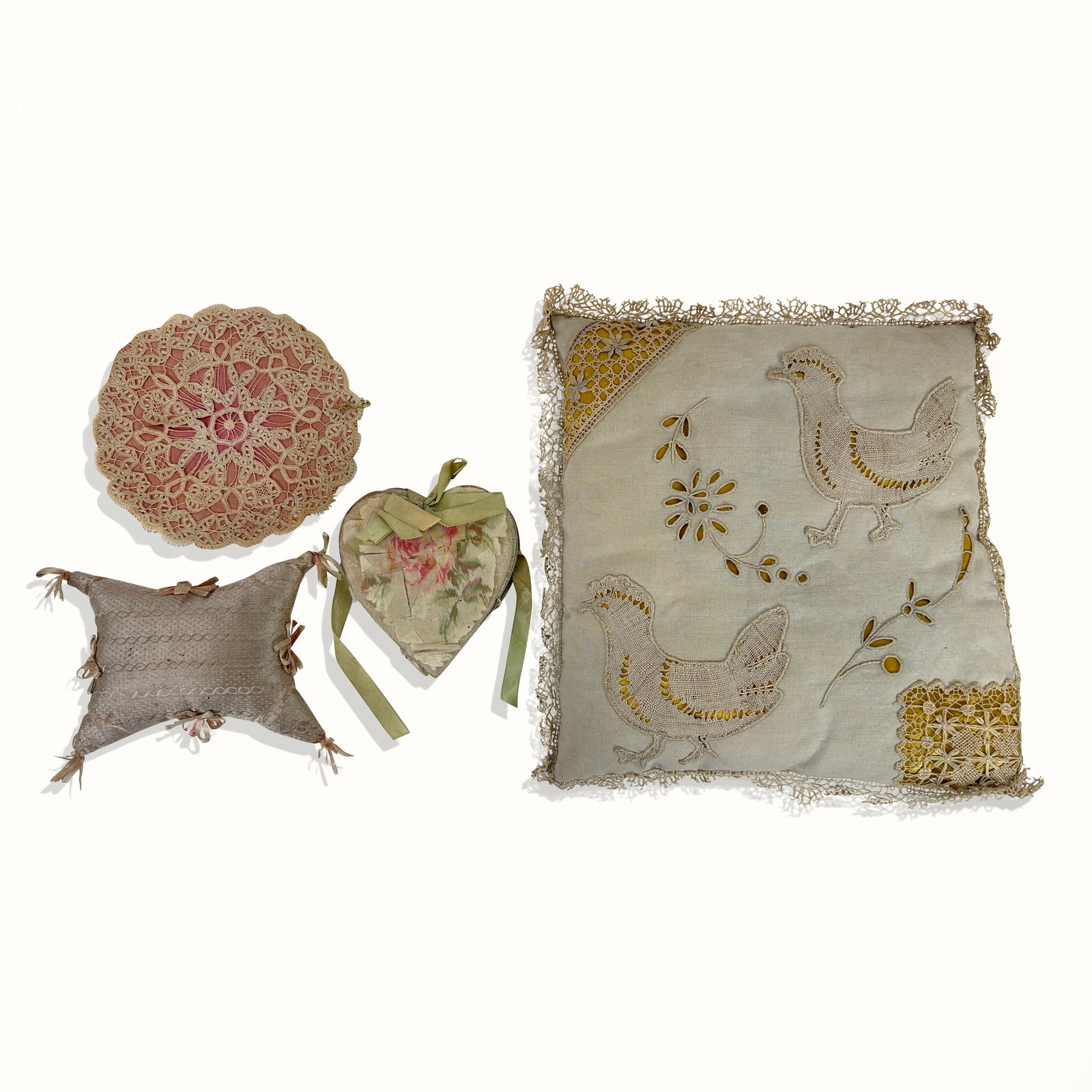 Four French Silk and Lace Articles: Four articles; lace pillow with chickens [11" sq.], pin cushion, a doily, and a folding heart valentine booklet. Aged and worn and tattered. Property sold on behalf of the Brooklyn Museum.
