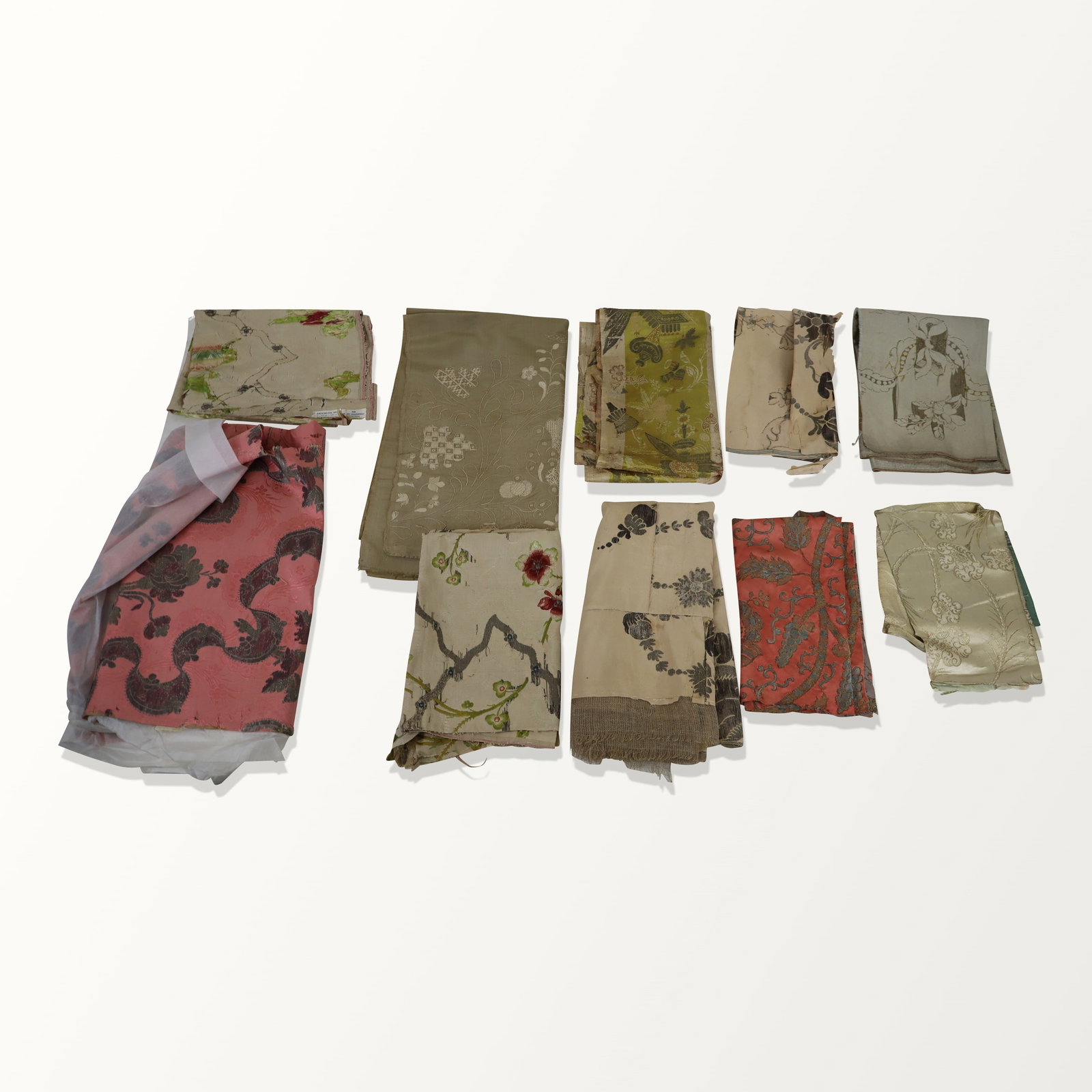European Brocade Silk and Metallic Thread Fabrics: Metallic fabrics; 18th and 19th century, French, Spanish, Italian, American. Muted colors and sparse designs. Tattered, fraying, losses.