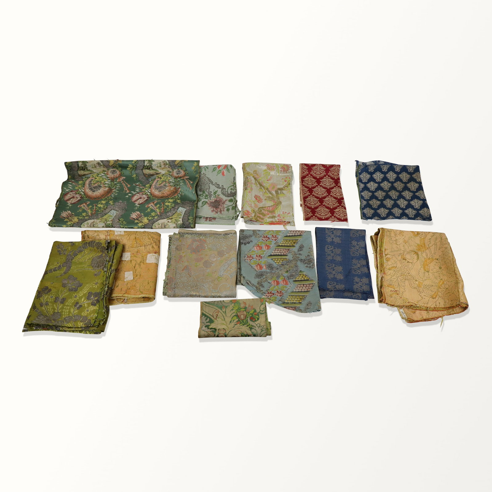 European Brocade Silk and Metallic Thread Fabrics: Fabrics and fragments; 17th to 19th century, Venice, Danish, French, etc. Finely brocade, colors. Tattered, worn, fraying, repairs.