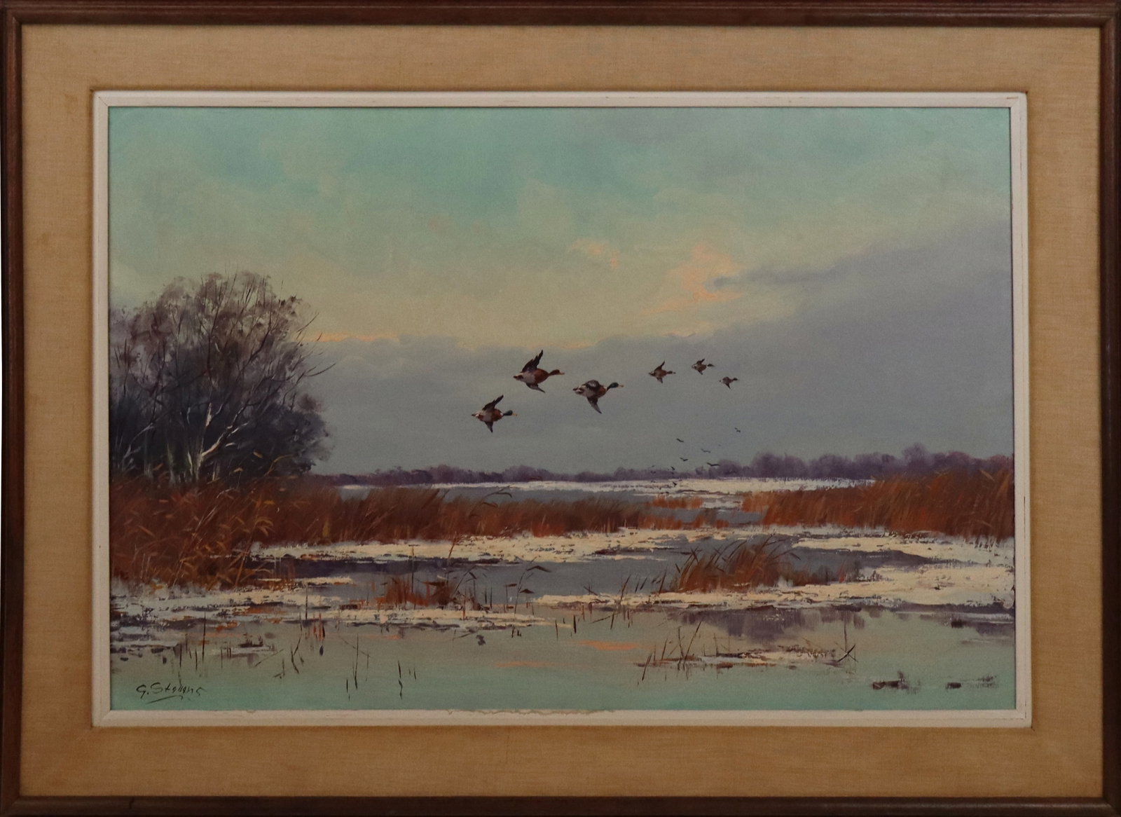 George STEVENS Geese in Flight Oil on Canvas: George Stevens (English, b. 1917) oil on canvas, marsh landscape of waterfowl in flight, signed lower left "G. Stevens". [23.5" H x 35" W; Frame: 32" H x 44.5" W]. Overall condition is good, some
