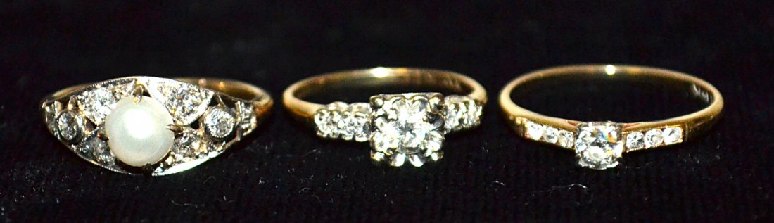 Three Ladies Engagement Rings: 1.) 14K Yellow gold and diamond engagement ring. 1 Round Old European cut diamond weighs approximately 0.20ct J-K color; SI-1/SI-2 clarity; measures approximately 3.93 x 3.92 x 2.27mm; thin to medium,