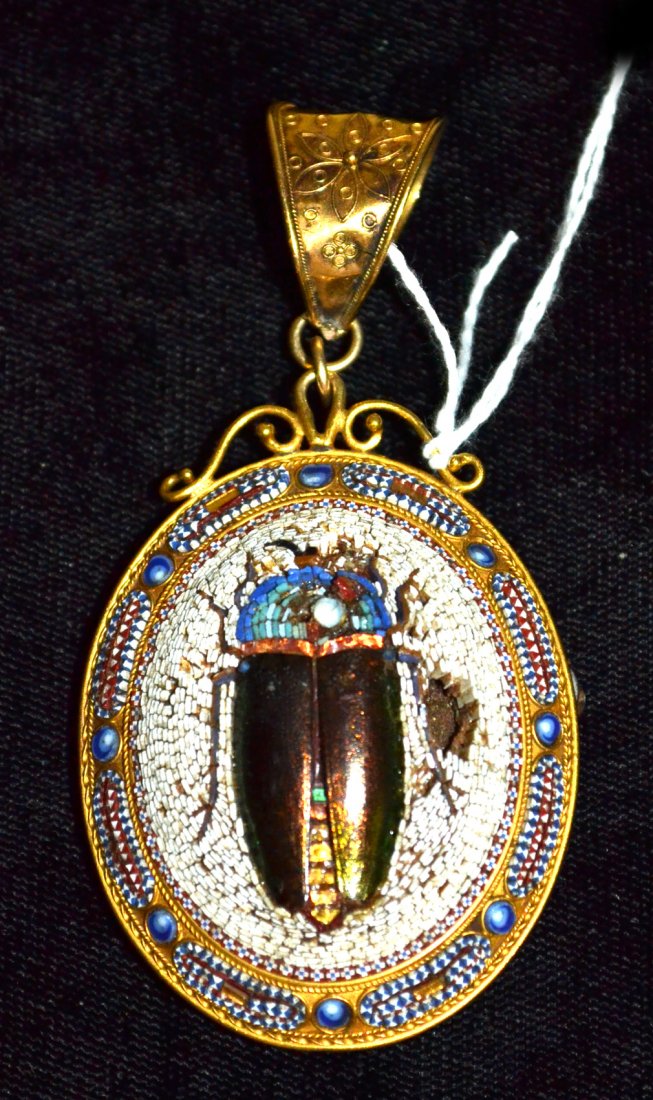 18K Yellow Gold Micro Mosaic Pendant: Pendant depicts beetle motif in the center. Extensive damage to mosaic; frame also damaged. Pendant weighs 20.0 dwt. (including shellac)