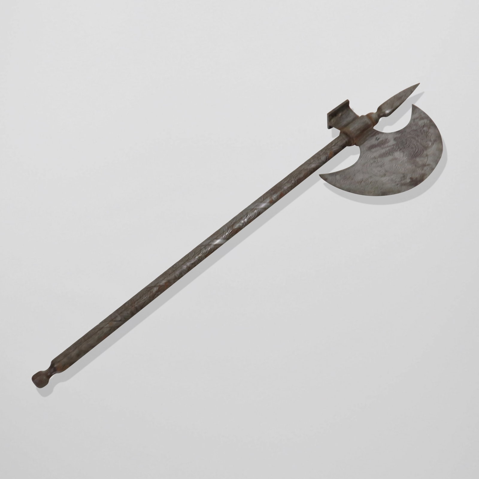 English Manner Metal Engraved Halbert: Metal engraved halbert (axe), mid 20th century reproduction, lightweight metal. [27" long]. Good condition.