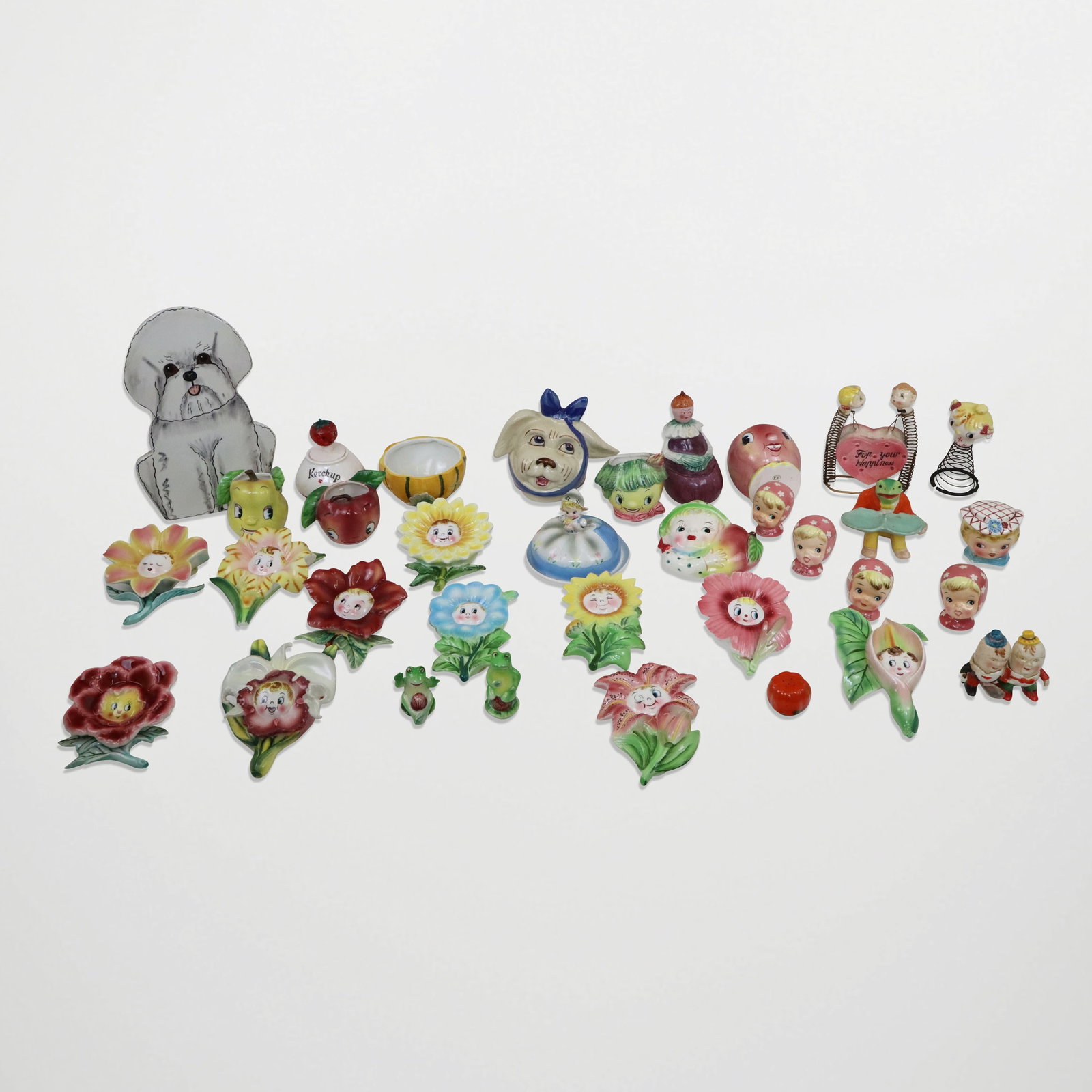 Porcelain Lot - Whimsical and "Happy" Articles: Assorted Japanese and Chinese Porcelains, Smiling face floral wall pockets and other porcelains of happy and whimsical themes, including frogs. [Wall Pockets approx. 6" H x 5" W]. Good condition,