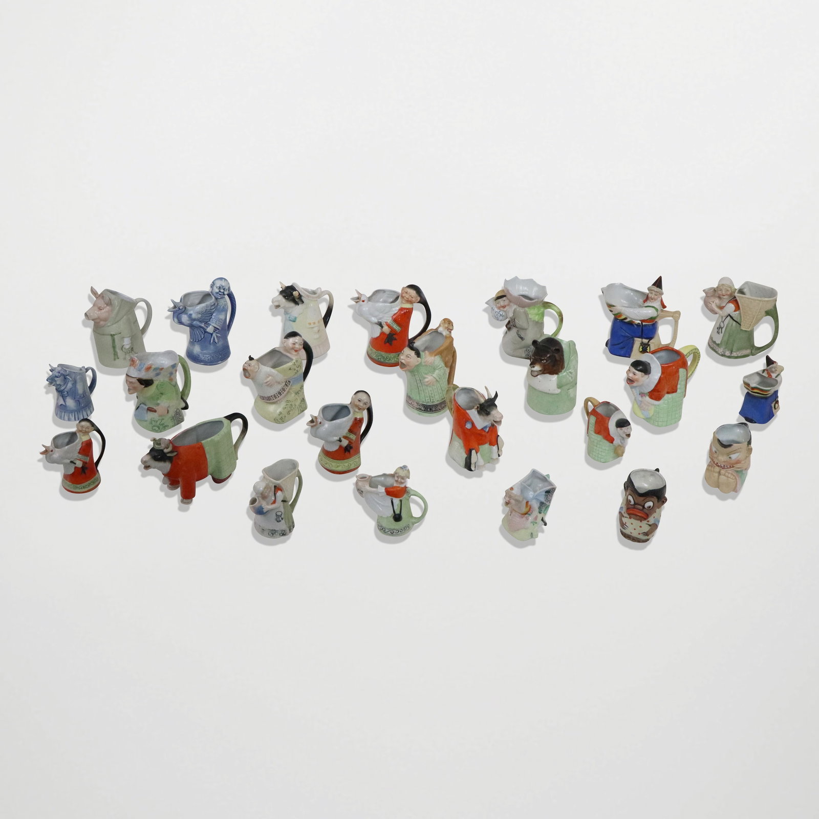 Large Lot Assorted Porcelain Creamers: Large lot assorted porcelain creamers, Various origins, mostly mid and late 20th century, Figural, animal, sets and singles. [Tallest 6"]. General good condition, there will be a few chips here and