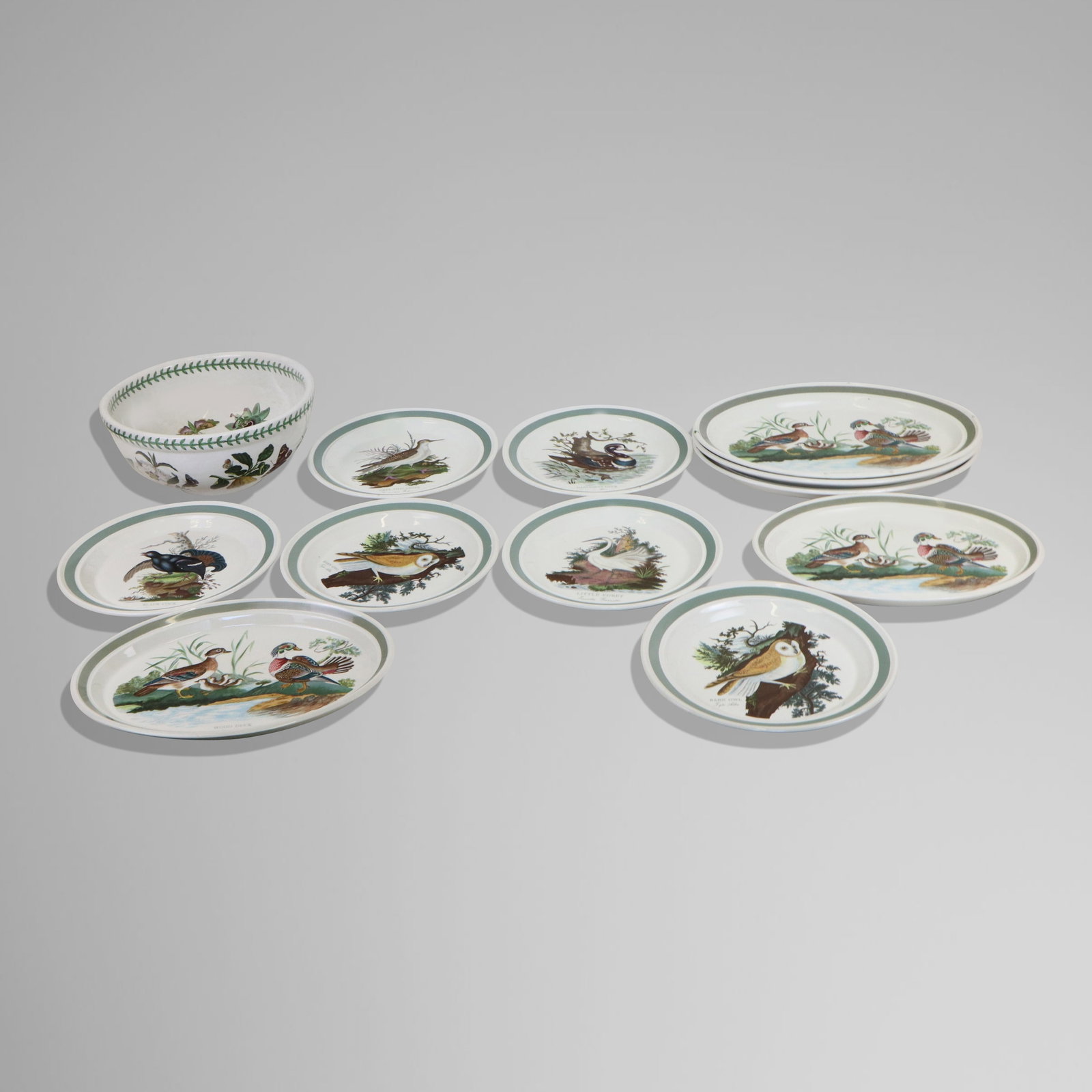 Portmeirion Assembled Serving Set, 12: Portmeirion porcelain serving set, English, 20th century, comprising: 6 plates [10" Diameter], 5 serving platters [14" & 15" wide], and a bowl. All good condition, not same pattern.