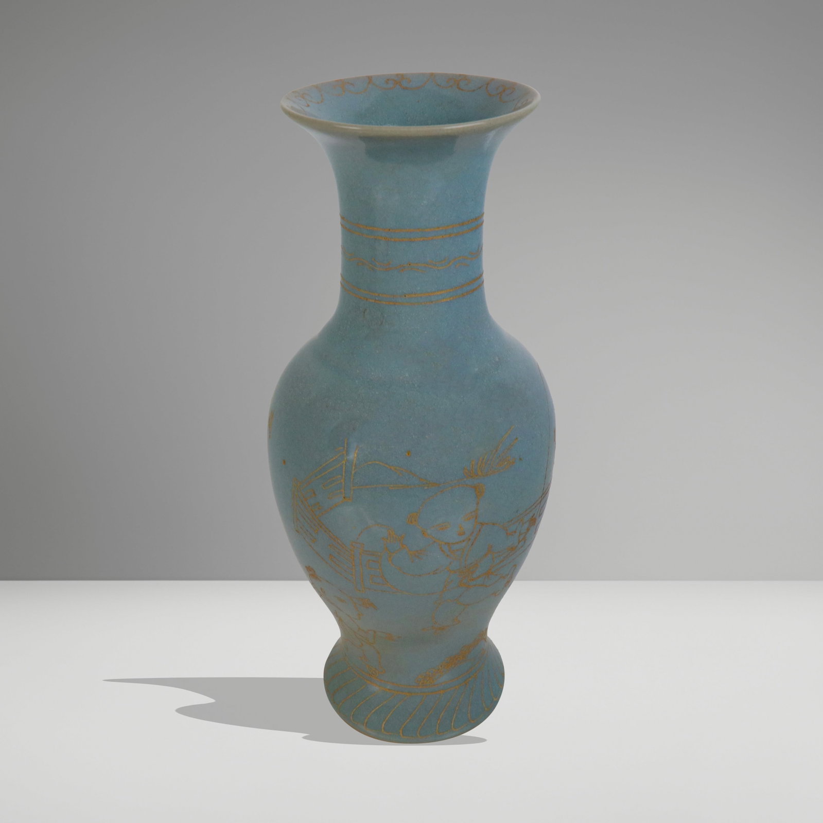 Chinese Blue Glaze and Gilt Design Vase: Chinese blue glaze and gilt design vase, gilt design over glaze of children playing, flare top. [11.5" H x 5" diameter]. Good condition.