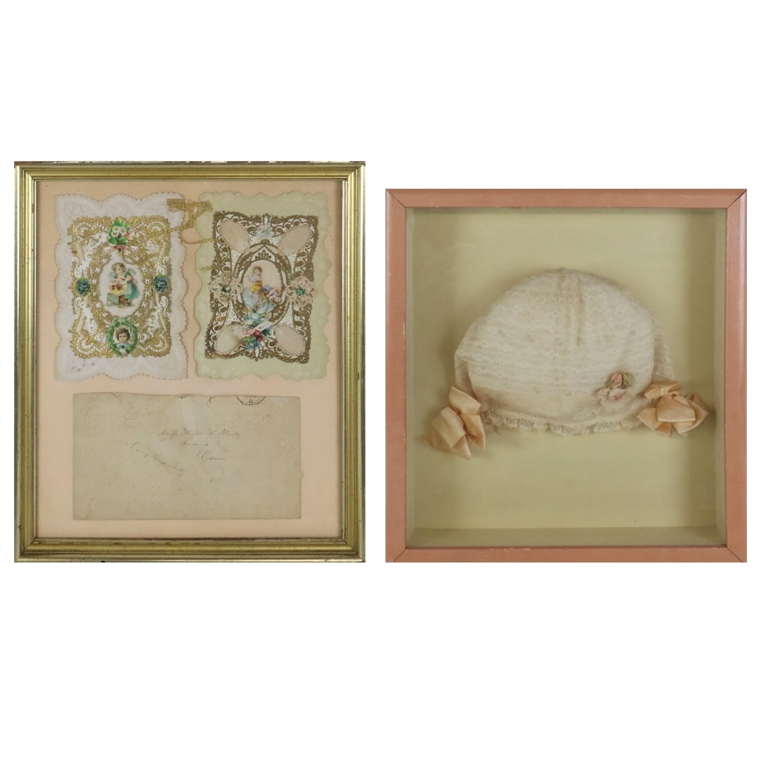 Two Framed Sentimental Objects: Two framed sentimental objects, comprising a baby's lace and satin hat in a pink frame [13.5" H x 12.25" W x 2.5" D]; and possibly a Victorian Valentine Day card [15" H x 12" W]. Overall condition is 
