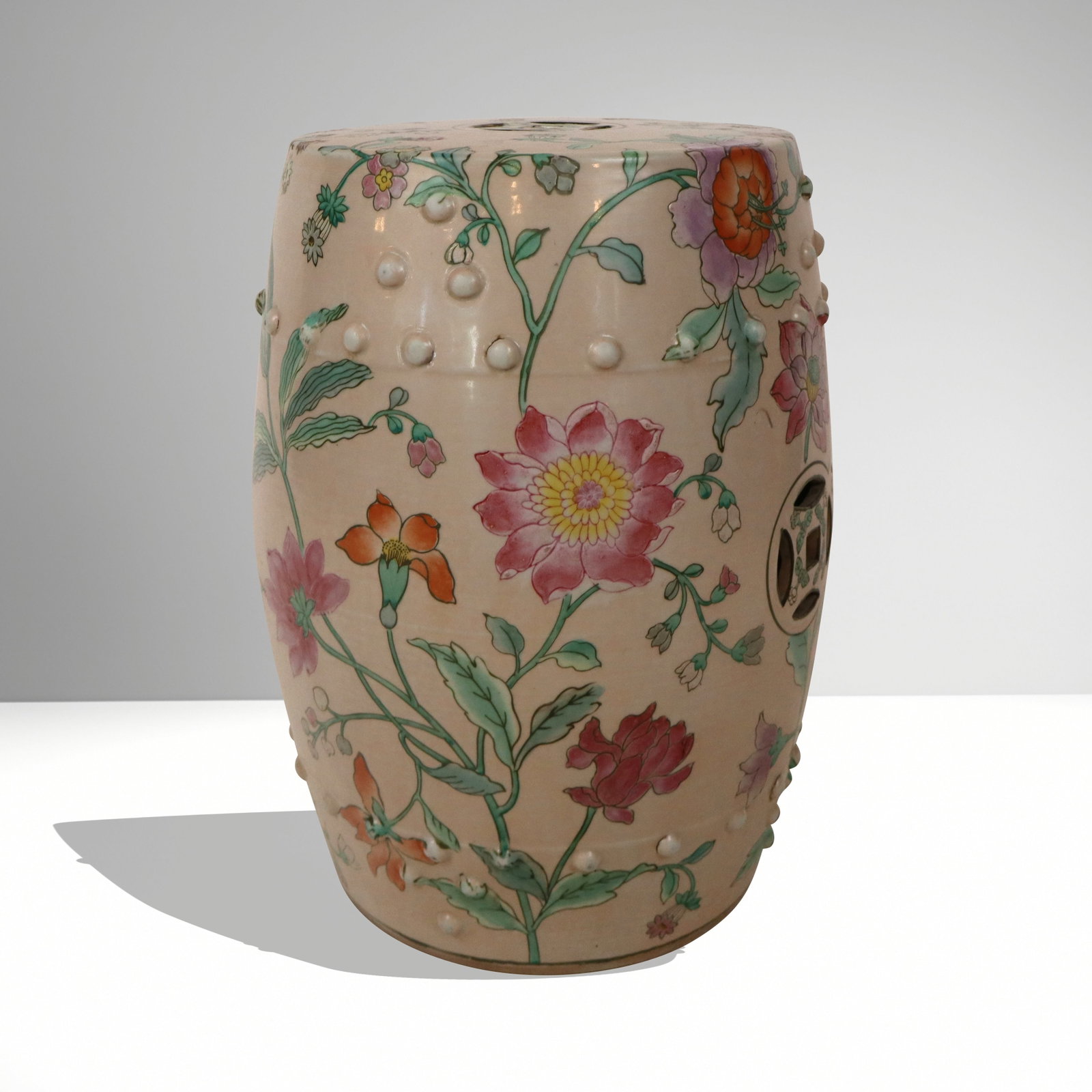 Chinese Export Garden Seat: Chinese export garden seat, 20th century, with floral decoration on a blush ground, stamped at base. [19" H x 13" Diameter]. Condition is good.