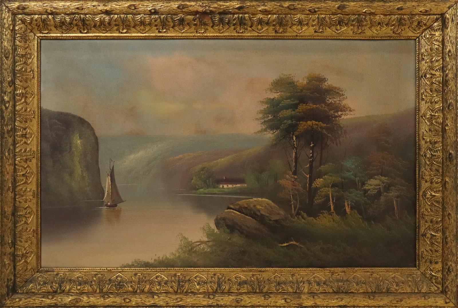 19th/20th Century Oil on Canvas River Landscape: Late 19th-early 20th century oil on canvas, river landscape with sailboat, gilt framed. [Canvas: 22" H x 36" W; Frame: 28.5" H x 43" W]. Overall condition is good, light wear commensurate with age, re