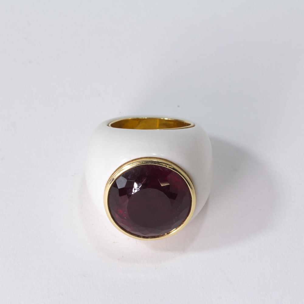 Cacholong, Rubellite & Gold Ring: Cacholong, faceted rubellite and gold ring, the collet-set rubellite faceted, approximately 28.58 cts., gold marked 14K. [23.42 dwt., Ring size: 6.5]. Overall condition is good. From the esteemed coll
