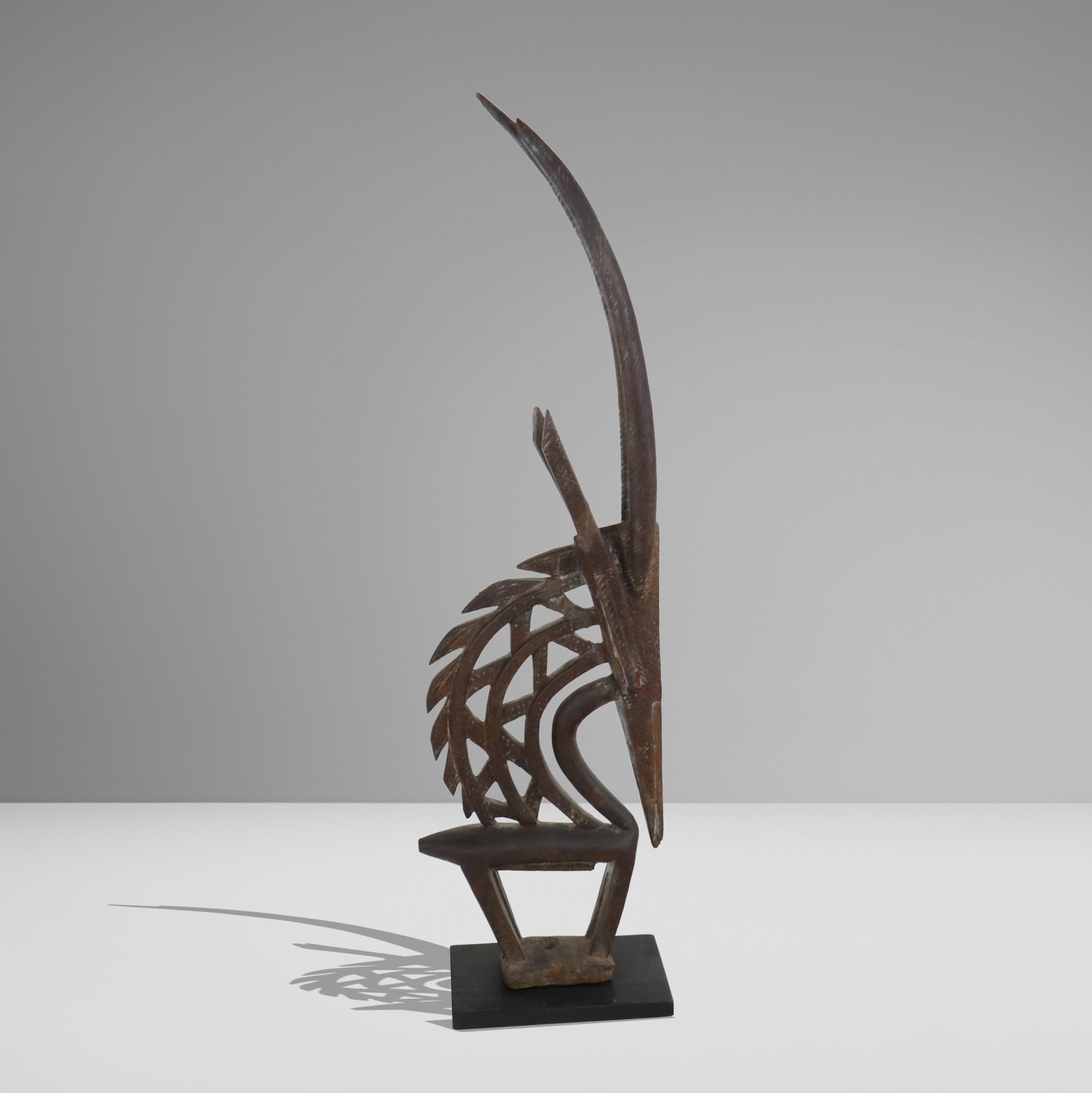 Bambara Chiwara Carved Antelope Figure: Chiwara antelope carved wood sculpture, Africa, Bambara, 20th century, on an affixed wooden base, accomapnied by a certificate from Segy Gallery, New York with the certificate signed by Ladislas Segy.