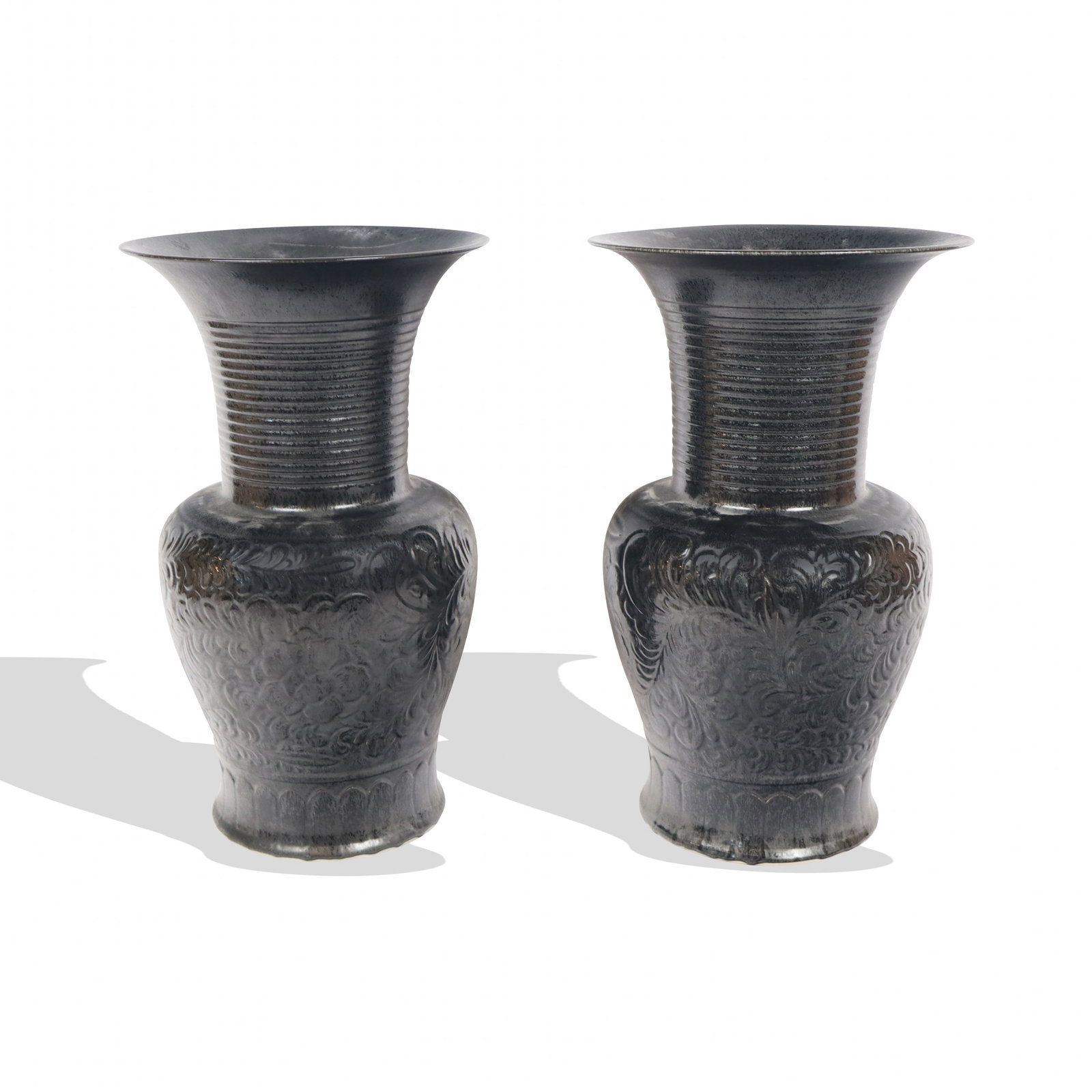 Pair of Chinese Black Glazed Porcelain Vases: Pair of Chinese black glazed porcelain vases, late 20th century, ribbed and flare tops and large designed wide bases, shimmering iridescent-style black glaze. [26" H x 16" diameter]. Good condition, a