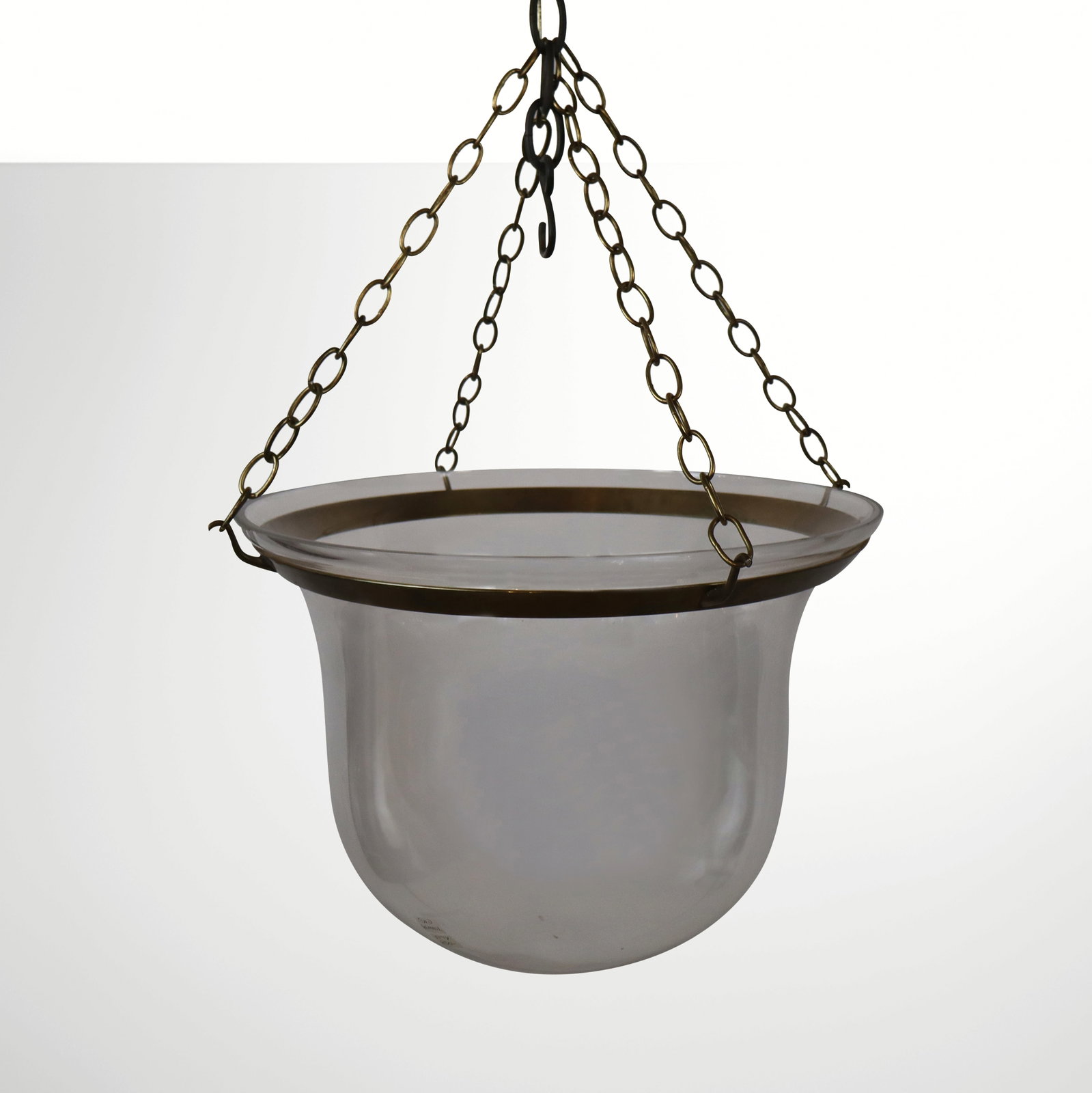 Crystal & Brass Bell Jar Fixture: Brass and crystal bell chandelier shade, suspended by a brass chain; lighting element absent. [30" H x 21" Diameter]. Condition is good with fleabites to rim.