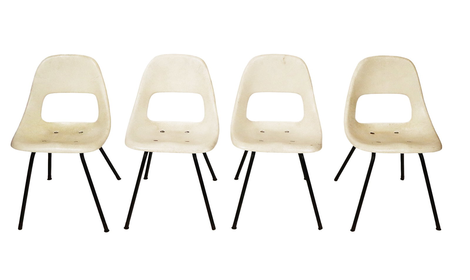Mid-Century Modern Fiberglass Stacking Chairs, 4: Mid-century modern fiberglass stacking chairs, circa mid-20th century, possibly produced by Krueger International, with metal legs, unmarked. [30" H x 19" W x 18" D; seat height: 18"]. Condition is go