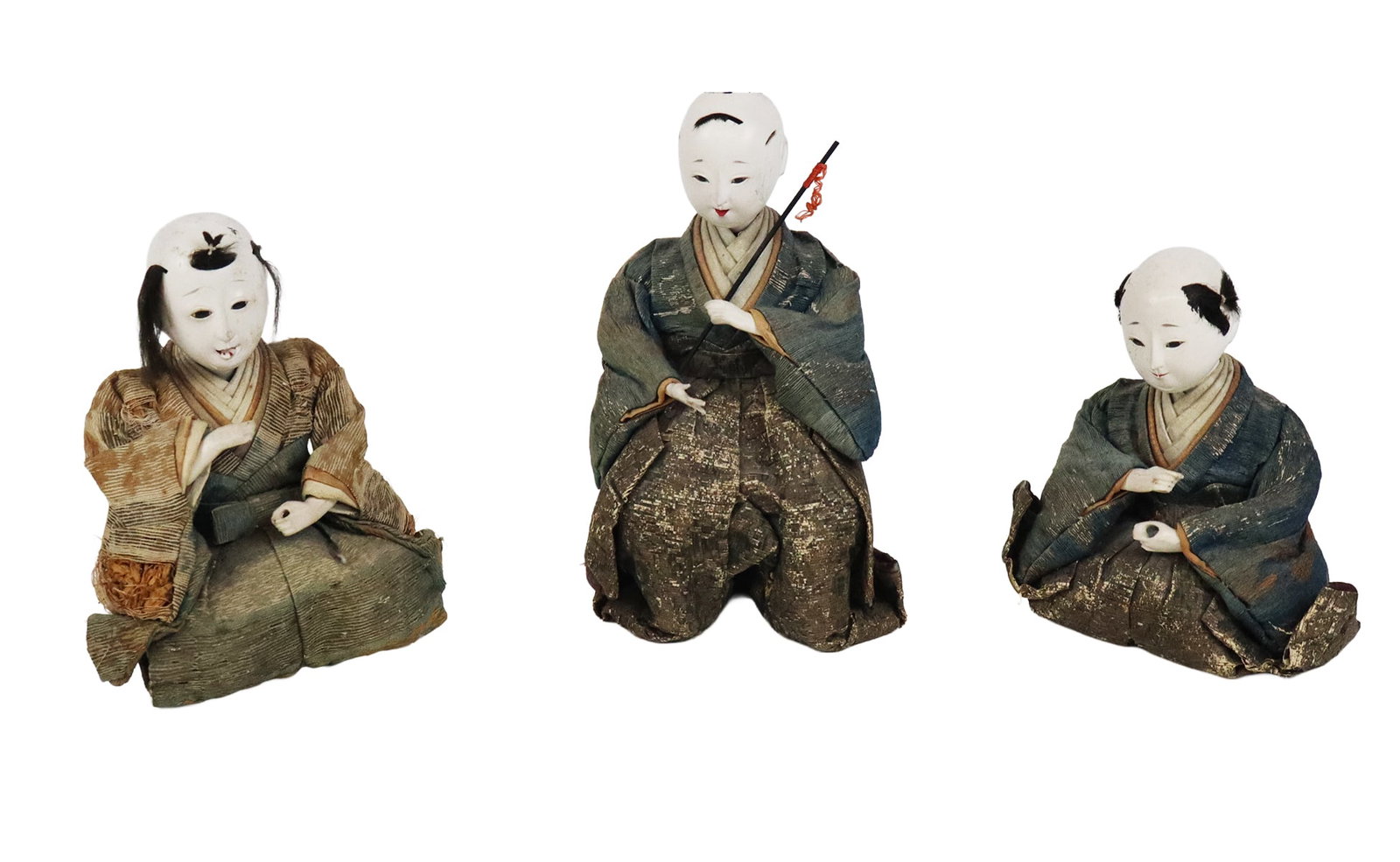 Three Meiji Period Japanese Ningyo: Three Japanese ningyo, Late Edo to early Meiji period, circa mid-19th century, all with gofun lacquered finish to head and arms, and adorned in silk robes, with removeable heads and human hair details
