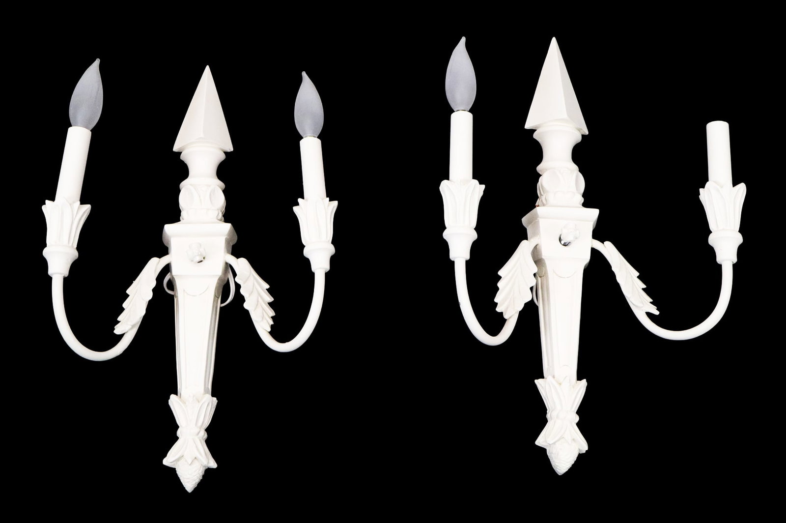 Pair Carved Contemporary Painted Palm Leaf Sconces: Pair of carved contemporary painted palm leaf sconces with obelisks tops. [20" H x 12" W]. Good condition. LOCATED AT 150