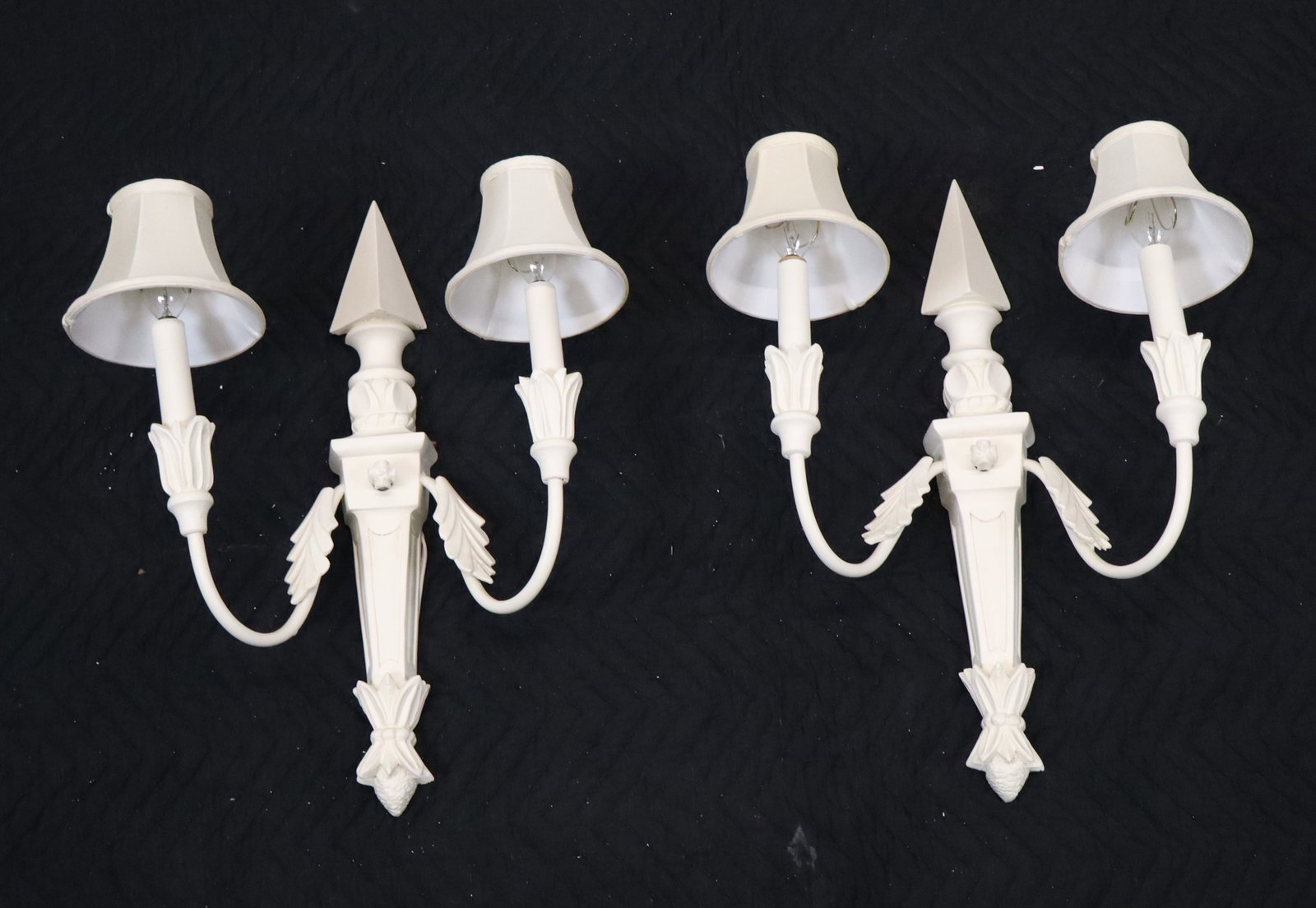 Pair Carved Contemporary Painted Palm Leaf Sconces: Pair of carved contemporary painted palm leaf sconces with obelisks tops. [20" H x 12" W]. LOCATED AT 150