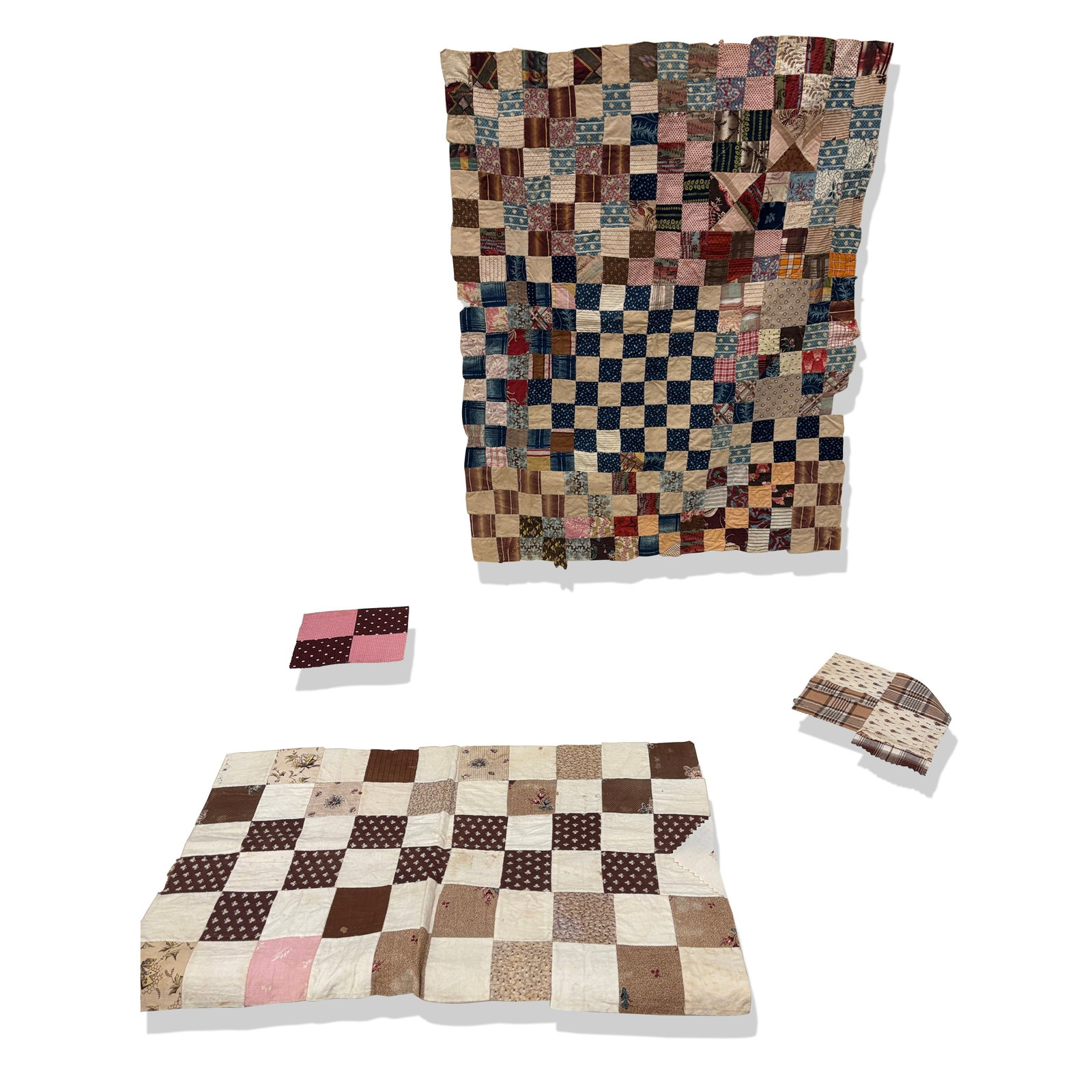 American Silk Patchwork Fragments: Patchwork fragments; 19th and 20th century; most re-sewn on backings, including a tattered pin cushion.. Aged and worn. Property sold on behalf of the Brooklyn Museum.
