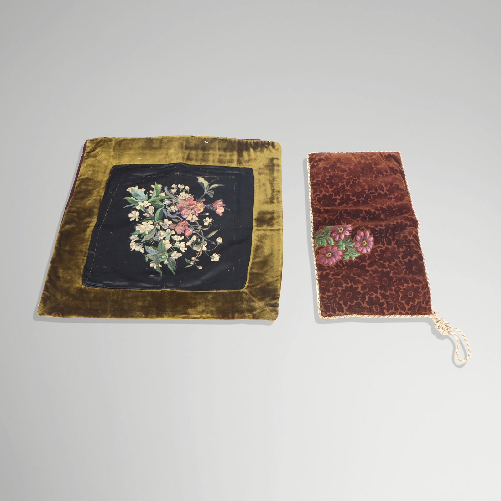 Two American Silk and Velvet Covers/Trivets: Two covers; 19th century, velvet and embroidered with painted floral centers. [Larger 18" sq.]. Fraying and wear. Property sold on behalf of the Brooklyn Museum.