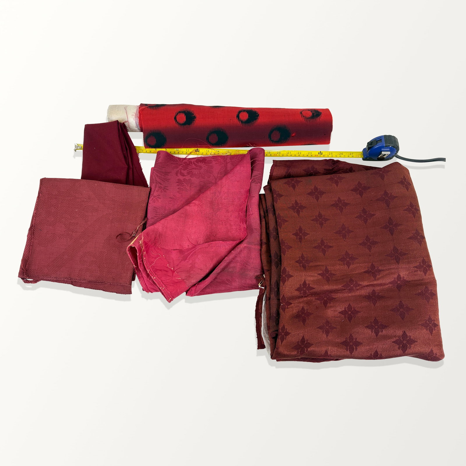 American and English Wool and Cashmere Fabrics: Wool and cashmere fabric; 19th and 20th century, mostly deep reds, some patterns. Property sold on behalf of the Brooklyn Museum.