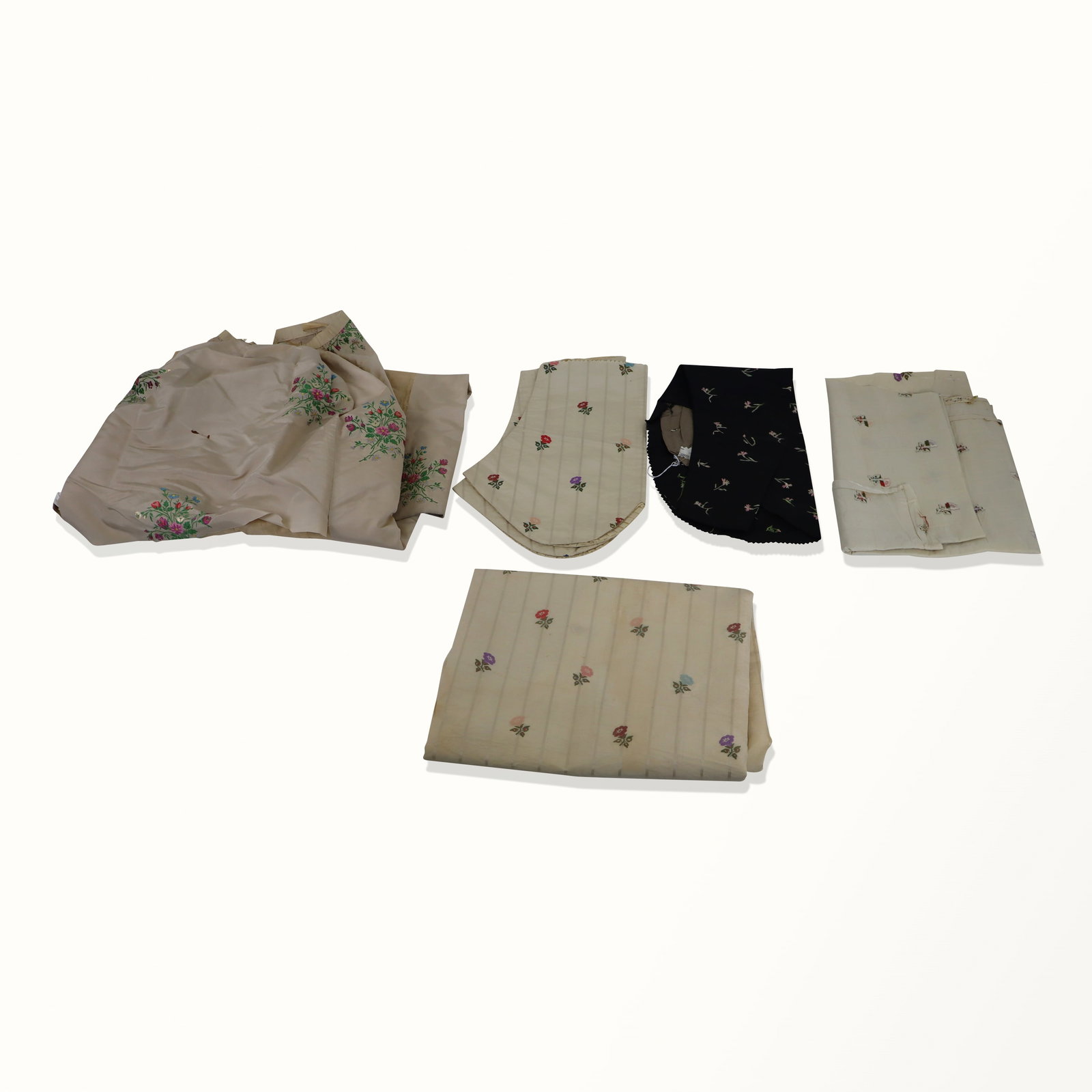 American Silk Fabric and Fragments: American fabrics; 19th and 20th century, brocade floral, one sleeve on black, floral on white curtain etc. Fair condition, some age spots and wear. Property sold on behalf of the Brooklyn Museum.
