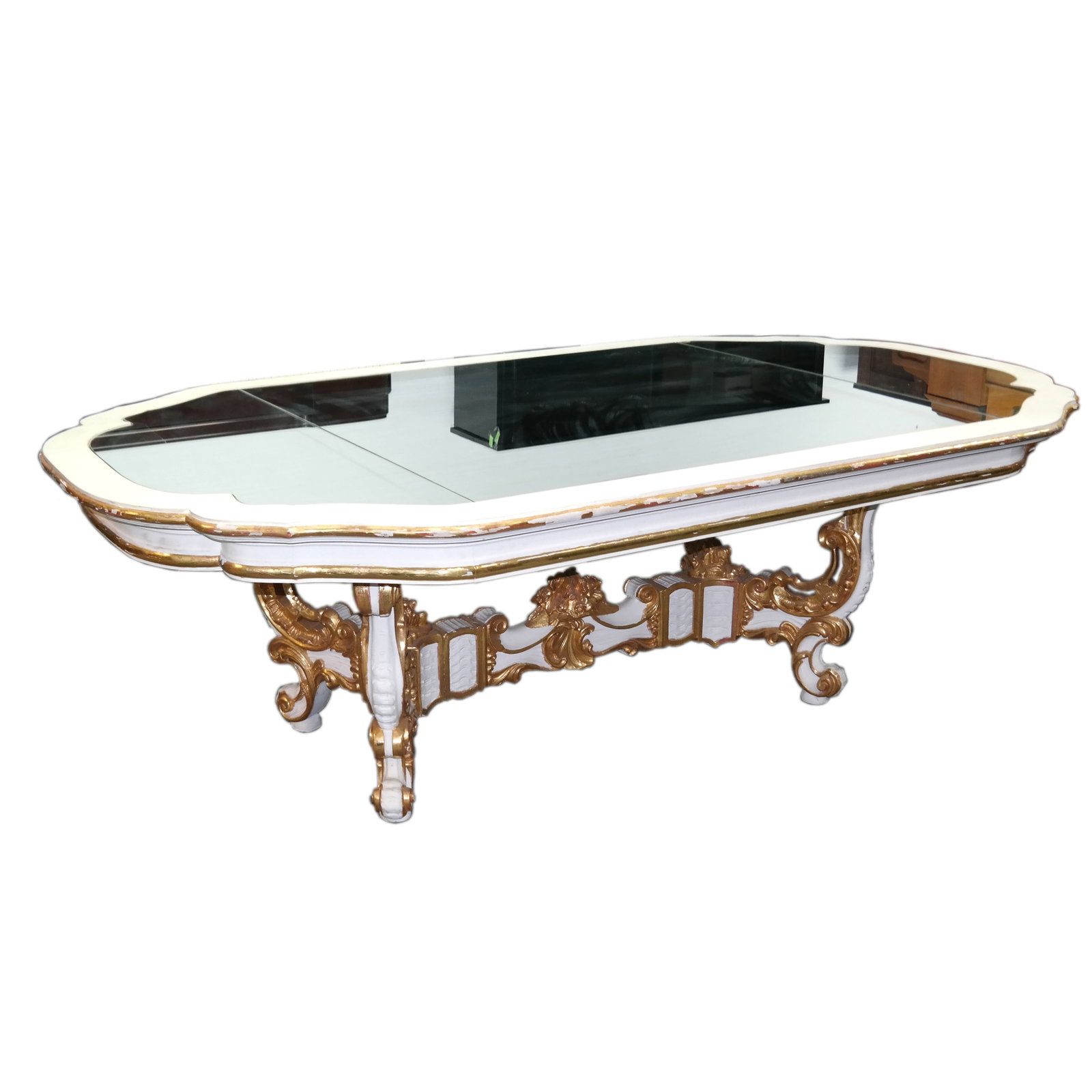 Carved & Painted Jansen-Manner Banquet Table: Jansen-manner banquet table having a paint decorated top with 3 inset mirrors above an elaborately gilded and carved painted Rococo base with shell carved and floral crest. [31 1/2" H x 98" W x 55" D;