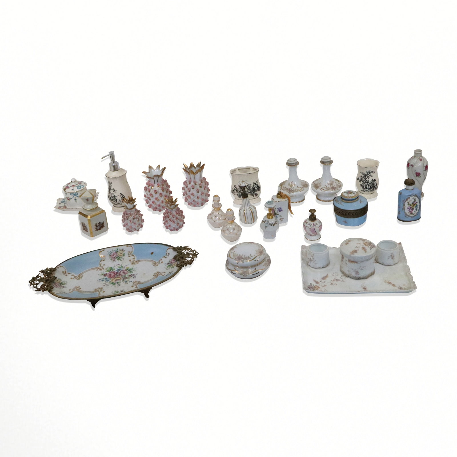 Assorted Porcelain and Other Vanity Items, 25: 25 assorted porcelain and other vanity items including vases, soap dispensers, perfumes, trays and boxes. [Decanters: 6" H x 4.5" Diameter]. Condition throughout is good to fair, some with minor losse