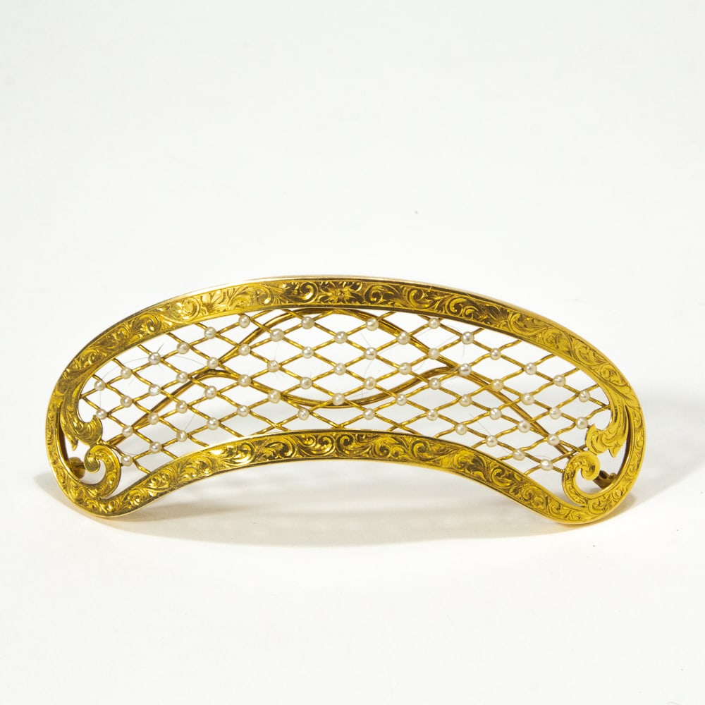 Victorian Gold & Seed Pearl Barrette: Victorian gold and seed pearl barrette, American, late 19th century, the Louis XV inspired frame with delicate engraved scrollwork enclosing a net field accented with seed pearls, marked "14k" to reve