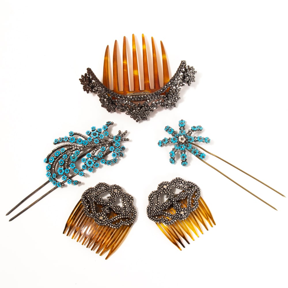 5 Victorian Cut Steel & Marcasite Hair Combs: Group of five Victorian cut steel and marcasite hair combs, late 19th-early 20th century, including a single marcasite comb with a shaped crest of floral swags; a pair of pierced cut steel medallion s