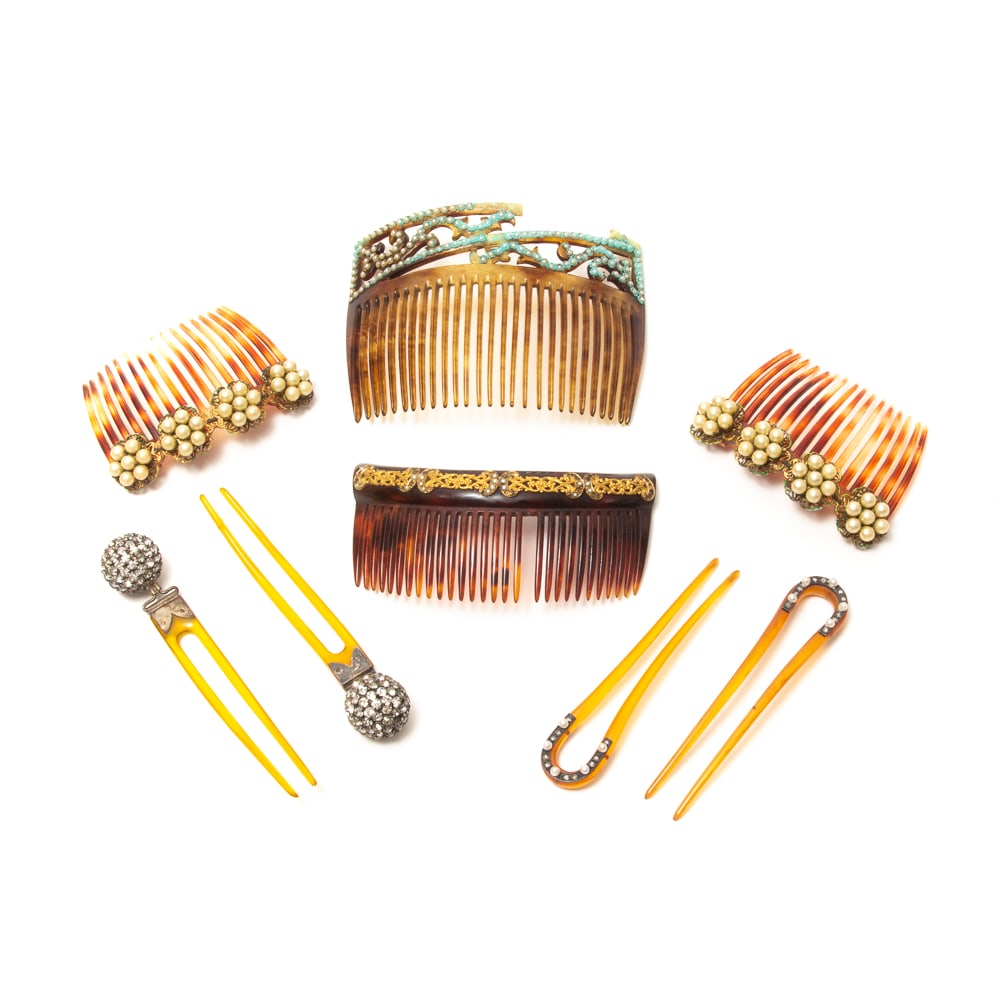Group of 8 French Paste & Seed Pearl Costume Combs: Group of eight French paste and seed pearl costume combs, early-mid 20th century, including a pair of disco ball French paste picks, a pair of combs with faux pearl flowers, a shaped comb with gilt me