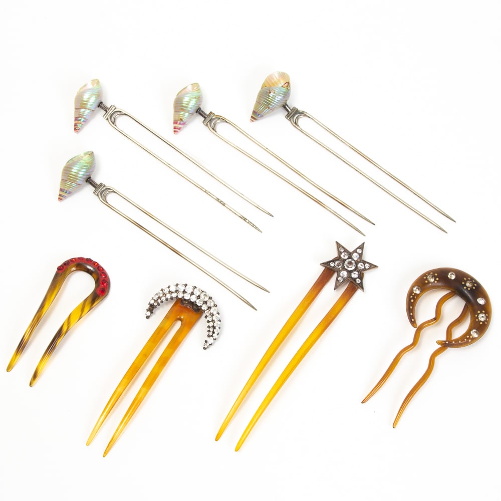 Group of 8 Decorative Hair Accessories: Group of eight decorative hair accessories, late 19th-20th century, including three art nouveau celestial hair pins with faux gem insets, a small pick with red painted border and faux gems, and a set 