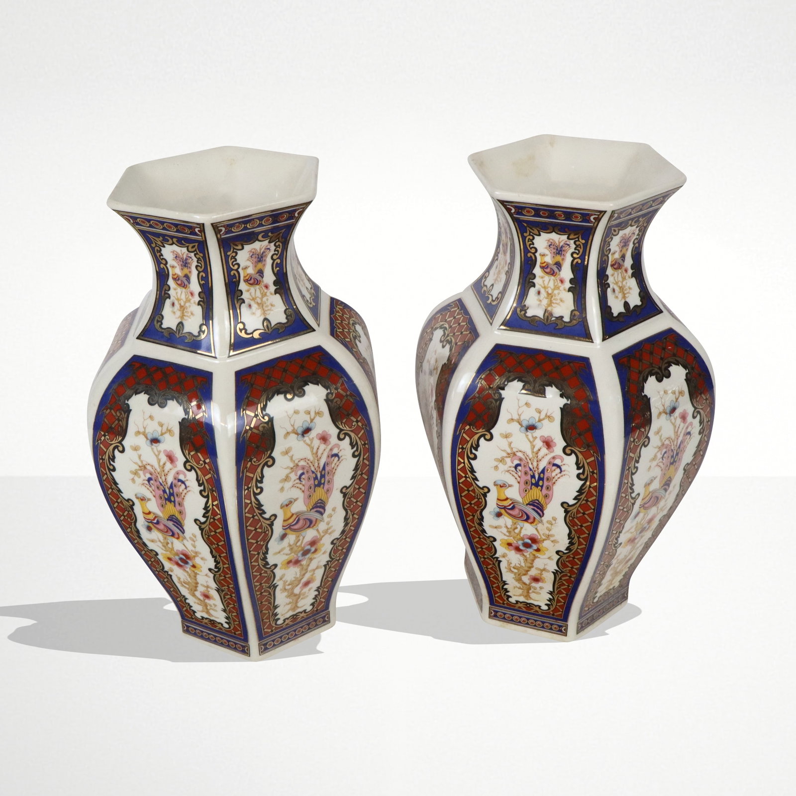 B & G Italy, Two Imari Porcelain Vases: B&G pair of Imari porcelain vases, Italy, 20th century, with transfer and gilt decoration throughout, each marked B&G at bases. [12.5" H x 8" Diameter]. Condition to each is good.