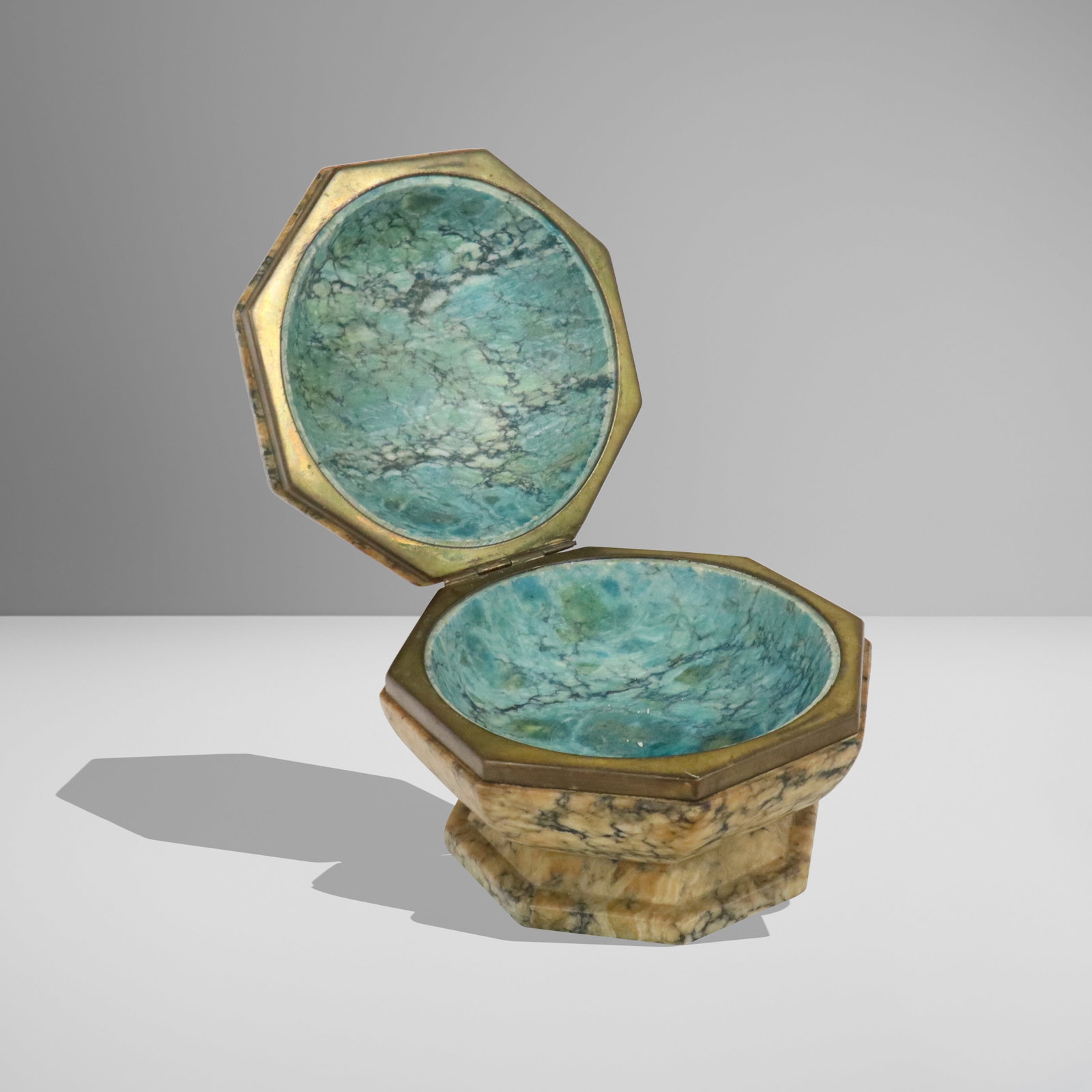 Hexagonal Alabaster Box: Hexagonal alabaster box, 19th century, possibly a travelling font, with a spherical blue-washed interior. [4" H x 5" Diameter]. Condition is good with some drying to stone and variation to color at