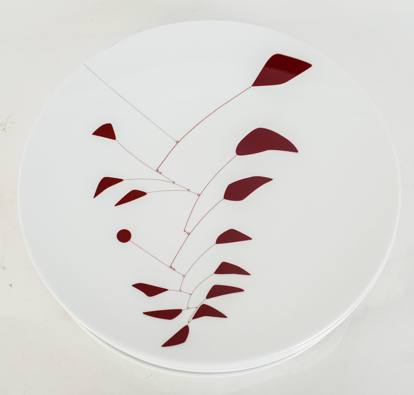 6 Bernardaud Limoges Plates after Alexander Calder: Six Bernardaud Limoges porcelain plates, made in France, with Alexander Calder's "Big Red" hanging mobile decoration and other works to each, marked Calder, Bernardaud, and editioned to bases. [10.5" 