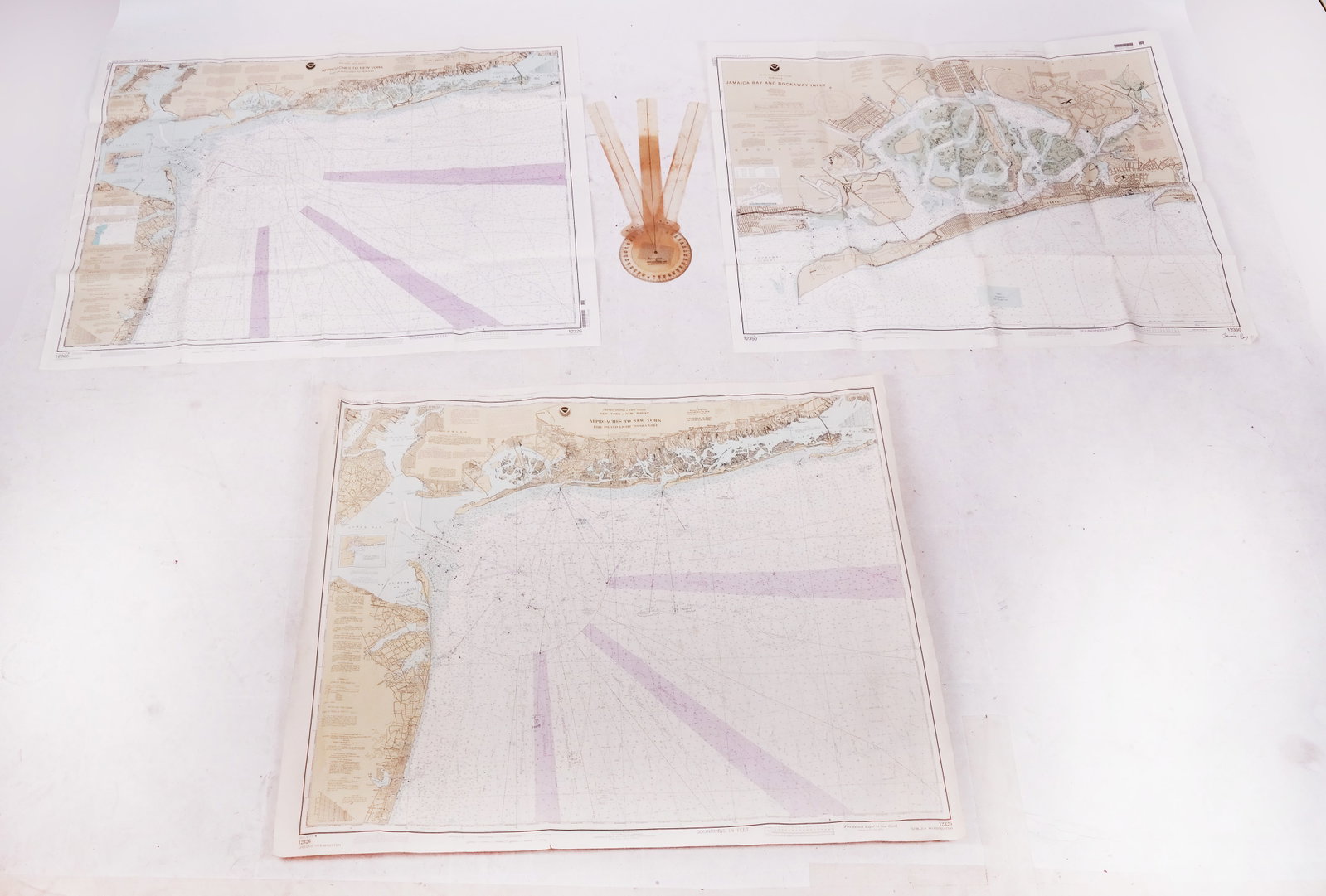 Nautical Maritime Sounding Depth Maps (4): Four (4) nautical/maritime sounding depth maps, of fishing/angling interest, of the East Coast of New York, New Jersey and surrounding areas, including water traffic lanes; together with a plastic nav