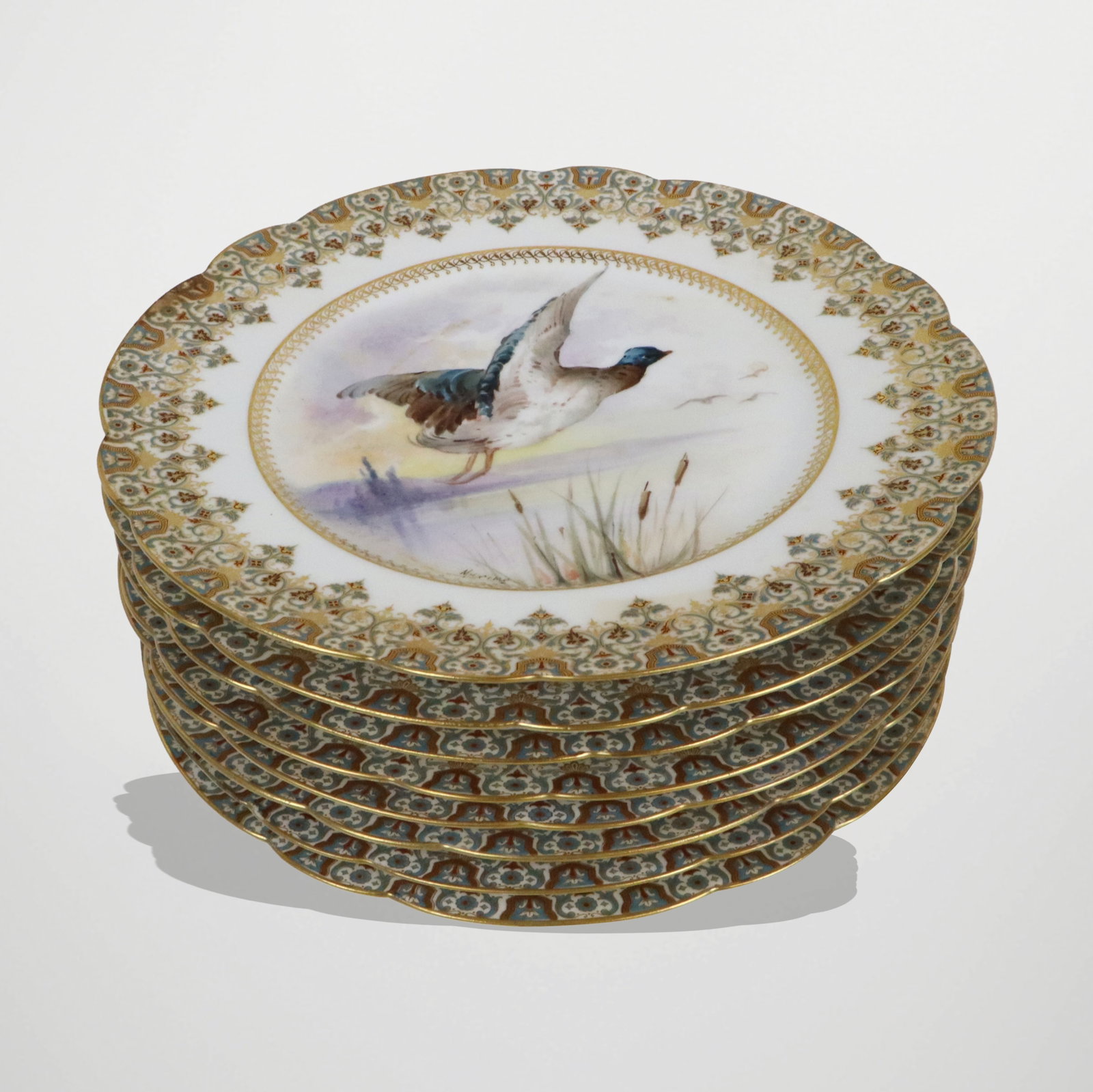 R. Delingers & Co. Hand-Painted Cabinet Plates, 8: R. Delingers & Co. hand-painted bird decorated cabinet plates, Limoges, probably last quarter of the 19th century, each Gothic Revival inspired intricately decorated border framing a landscape with bi