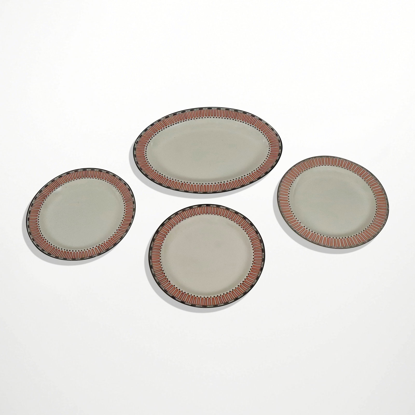 Wedgwood "Etruscan" Creamware Plates, 4: Wedgwood "Etruscan" pattern creamware plates, English, late 18th/early 19th century, comprising an oval platter [14.25" L x 10.75" W], and three dinner plates [10" Diameter], mark to underside with