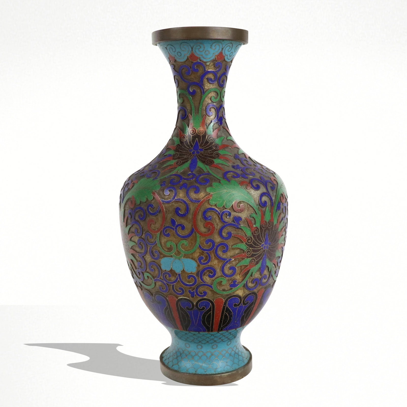 Chinese Cloisonne Vase: Chinese cloisonne vase, 20th century, with floral decoration and copper ground, marked faintly China to base. [9.5" H x 5.25" Diameter]. Condition is good.