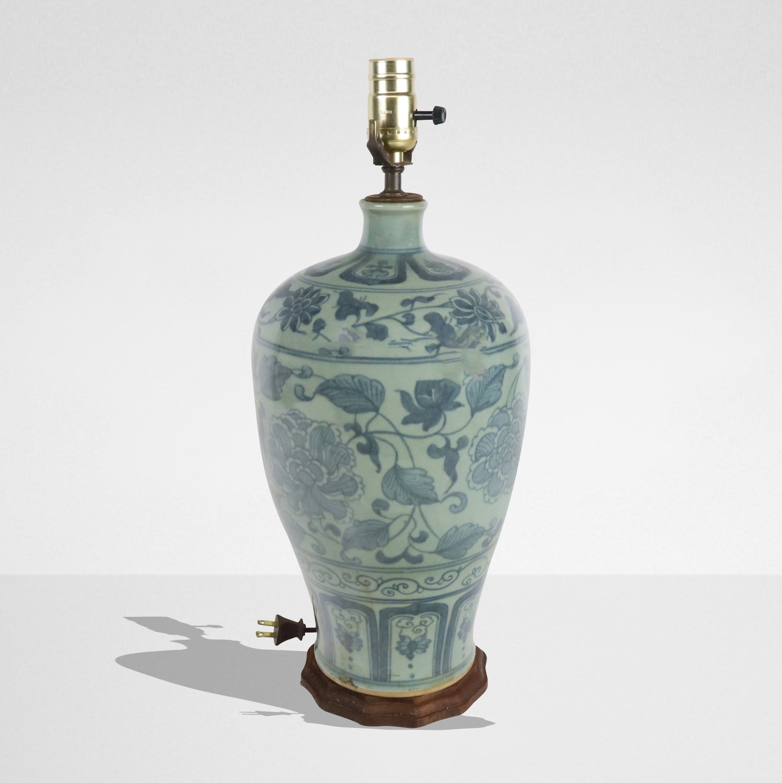 Chinese Blue and Celadon Porcelain Vase as a Lamp: Chinese blue and celadon porcelain meiping vase, Qing Dynasty, with hand-painted floral details, mounted as a lamp on a wooden base. [Excluding socket: 15.5" H x 8" Diameter]. Condition is good, wirin