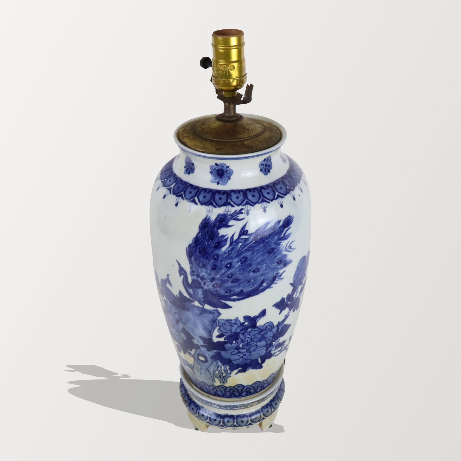 Chinese Blue and White Porcelain Lamp: Chinese blue and white porcelain lamp, later 20th century, with hand painted decoration and a porcelain base, unmarked. [16" H x 8.25" Diameter]. Condition is good, wiring untested.