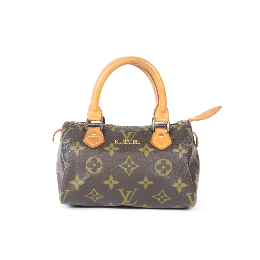 Louis Vuitton Nano Speedy Monogram Handbag: Louis Vuitton Nano Speedy monogram handbag, 20th century, in LV printed pebbled leather, and with canvas lining, with Louis Vuitton Made in France to interior label, and with K.T.R. monogram. [Less st