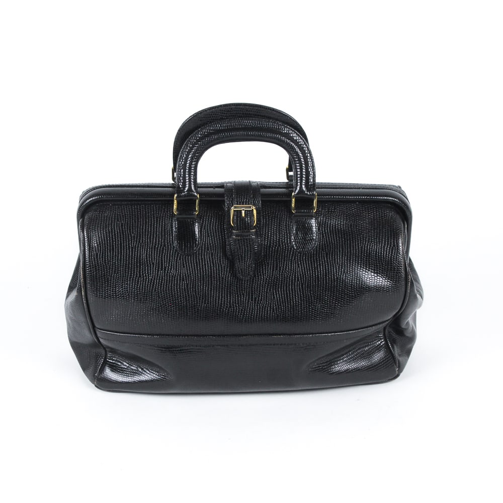 Fendi Frame Closure Lizard Skin Handbag: Fendi frame closure lizard skin handbag, 21st century, with gold tone hardware, exterior pocket, marked Fendi to hardware and to interior label, lined in calfskin. [8" H x 13" W x 7" D]. Condition is 