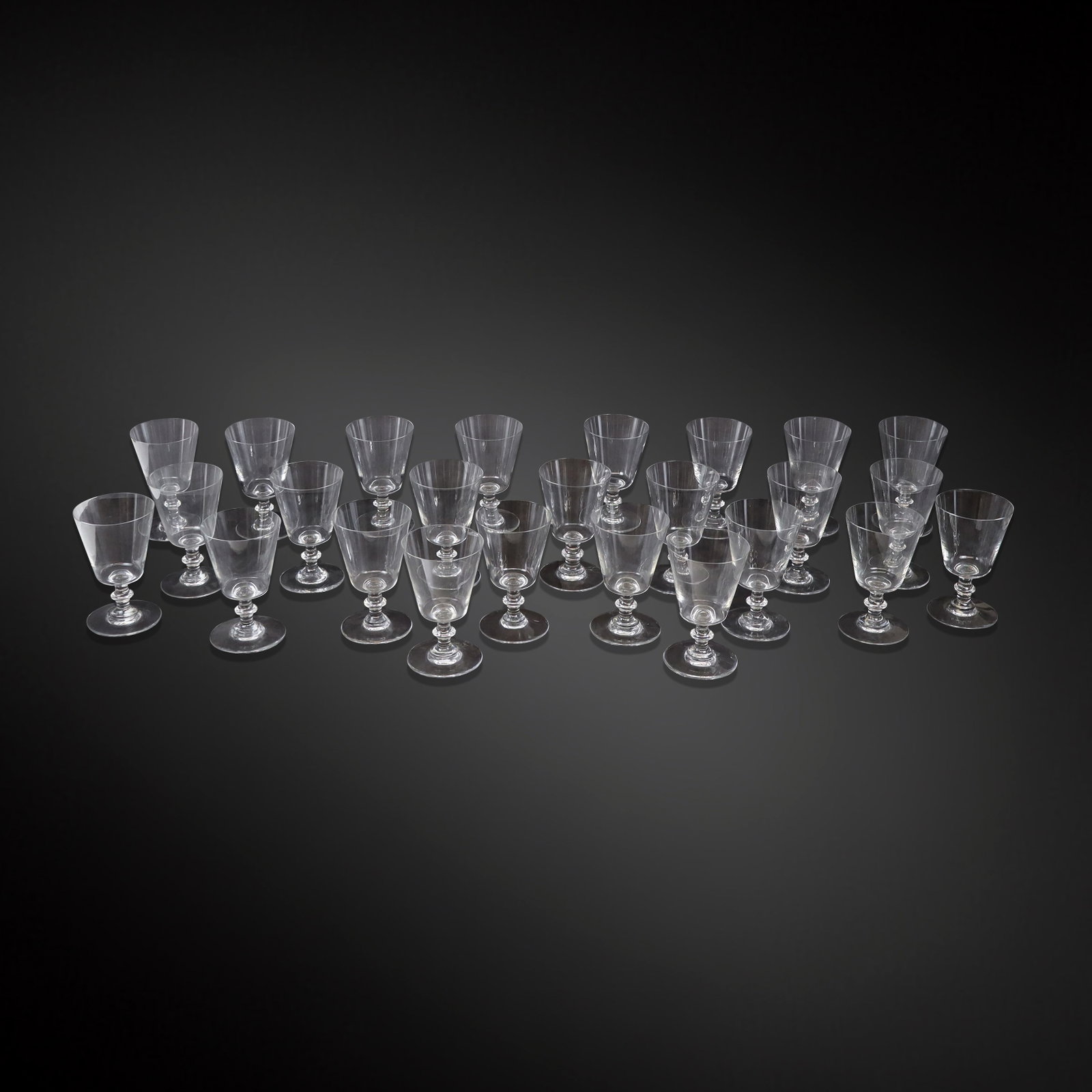 Baccarat "Embassy" Crystal Glasses, 25: Baccarat set of twenty-five "Embassy" pattern water glasses, mark to underside of foot. [6" H x 3.75" Diameter]. Overall condition is good.