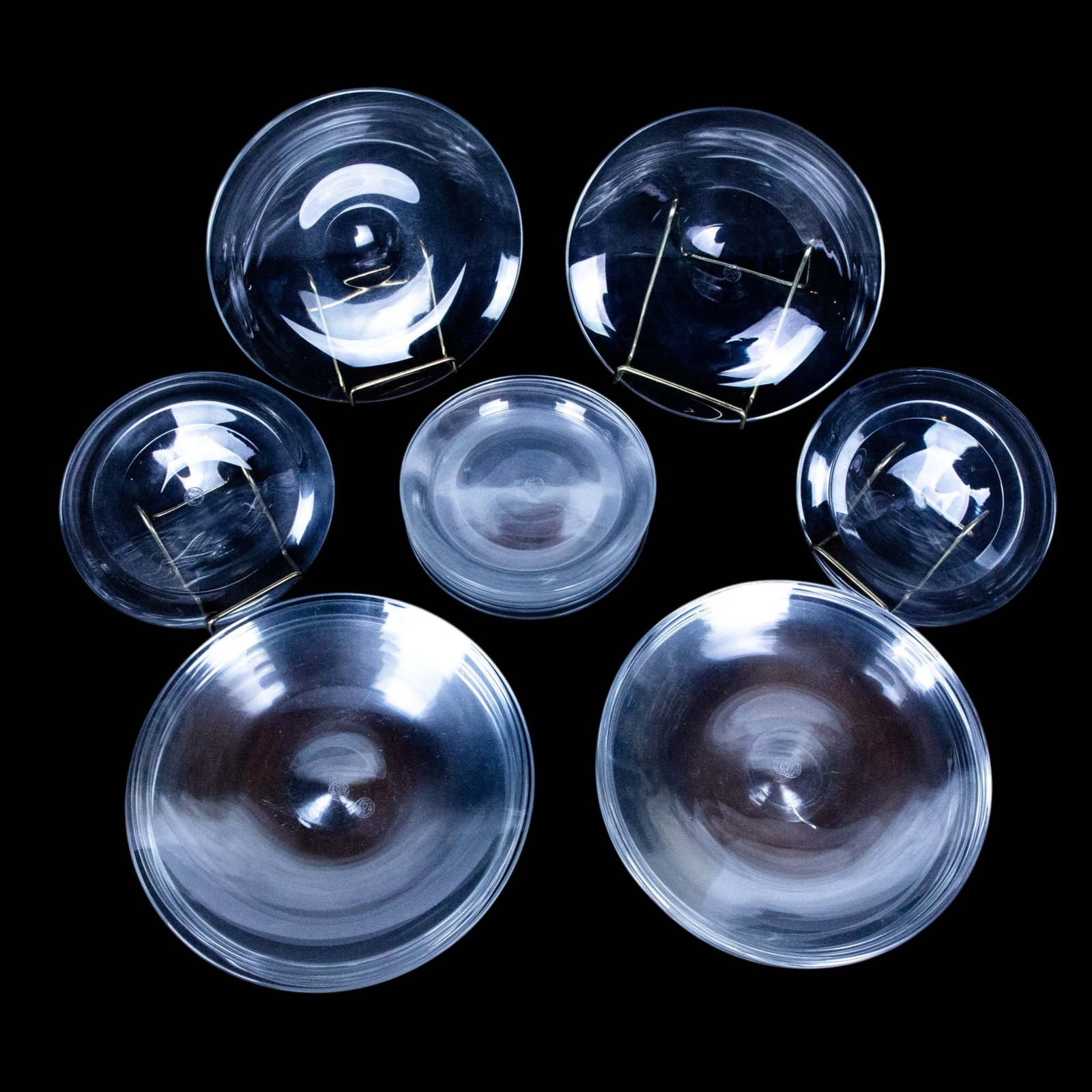 Baccarat Crystal Plates, 28: Baccarat crystal plates, comprising ten bread and butter plates [5.75" Diameter], and eighteen hors d'oeuvre plates [7.5" Diameter], acid mark to underside of base. Overall condition is good.