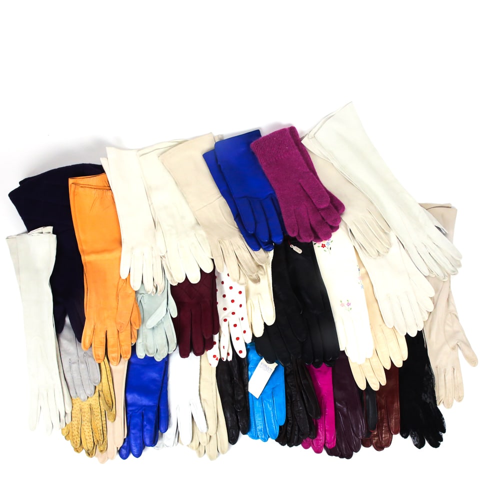 Large Group of Lady's Vintage Gloves, 34 Pairs: Large group of women's vintage gloves in various lengths comprising five pairs of lined leather gloves, ten pairs of wrist length leather gloves, ten pairs of opera length white and off-white leather 