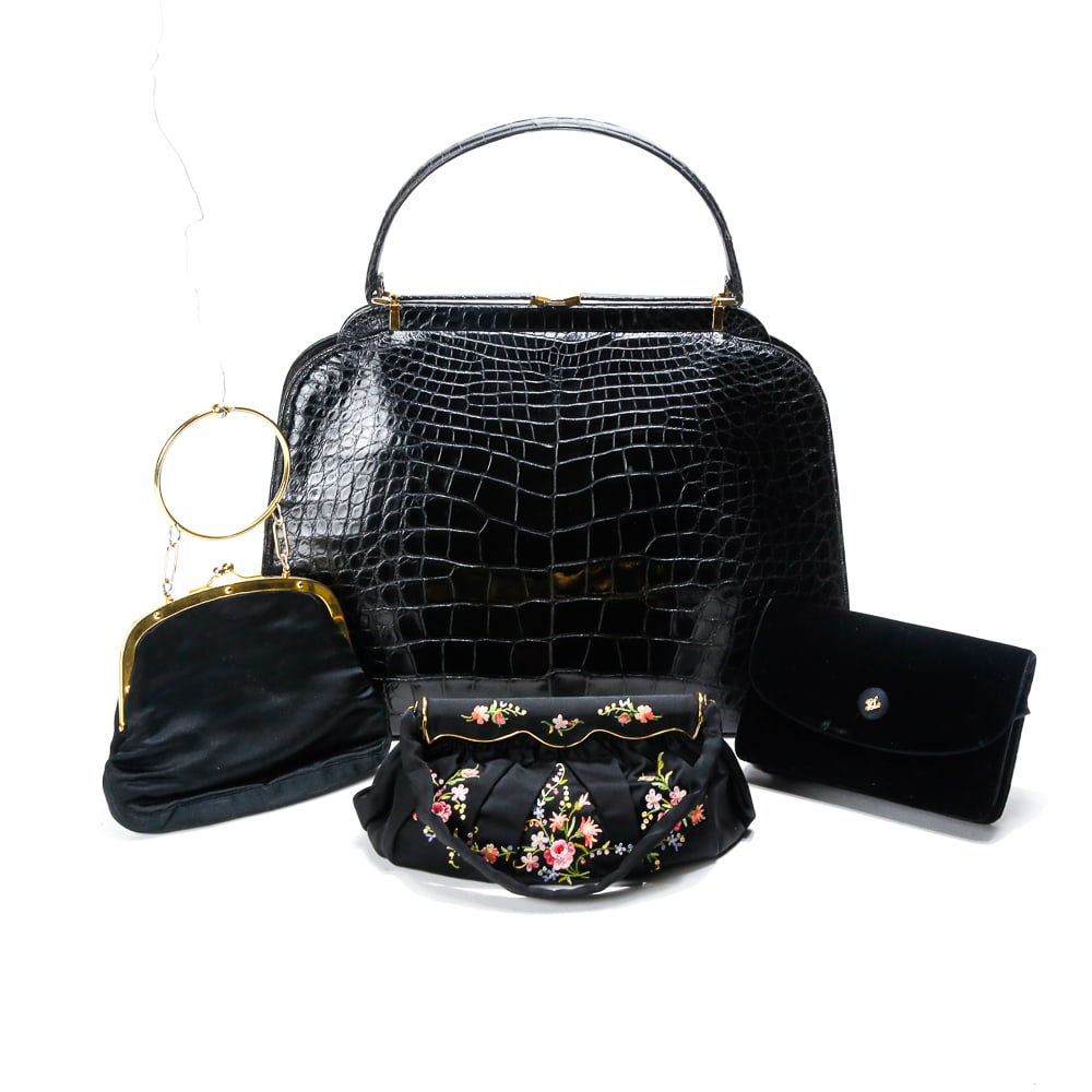 Four Assorted Vintage Handbags: Vintage handbags comprising a Ralph Lauren velvet clutch, a Koret black silk handbag with gold tone hardware and suede lining, an embroidered black silk handbag marked Made in France to interior, and 