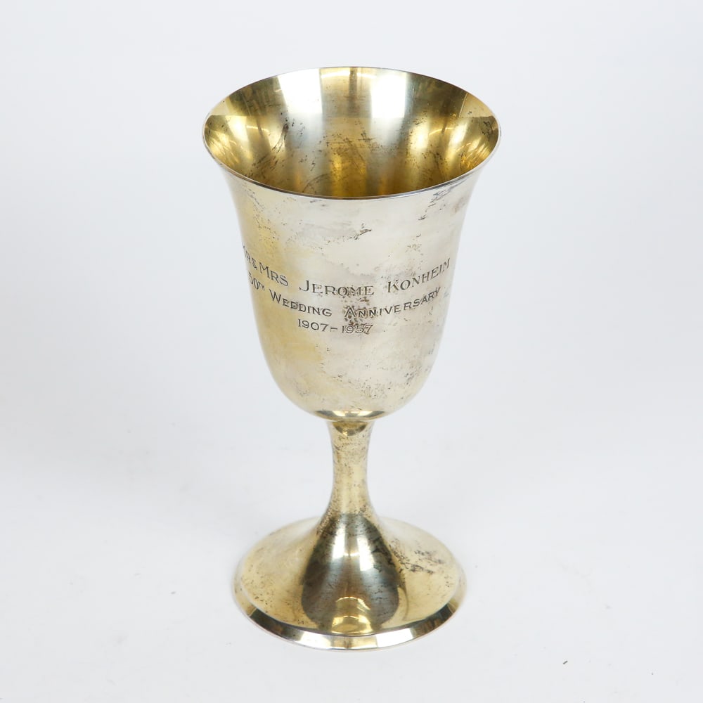Steiff Sterling Silver Goblet: Steiff sterling silver engraved goblet, interior with gold wash, mark to underside of foot. [5 ozt., 6.5" H x 3.5" Diameter]. Overall condition is good, tarnished and with scratches from normal wear.