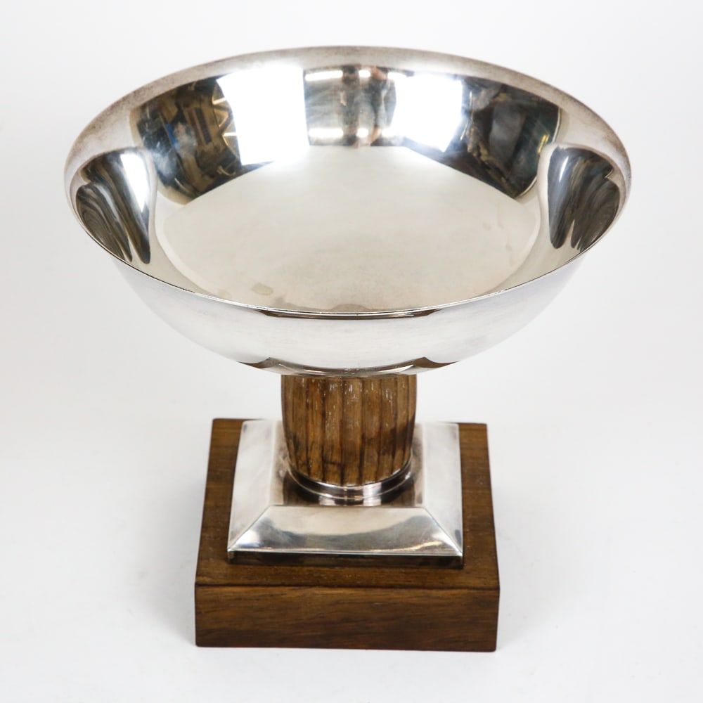 Tetard Sterling Silver & Wood Center Bowl: Tetard sterling silver and wood center bowl, French, circa 1930s, mark to exterior lip of bowl and bottom edge of base. [7" H x 8.25" Diameter]. Overall condition is good, wear commensurate with age.