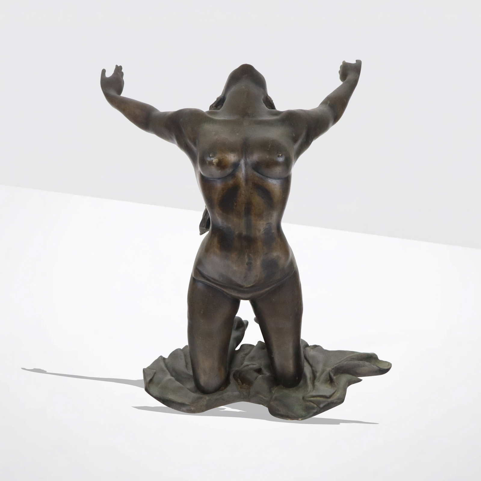 Bronze Figural Nude: Bronze nude figural sculpture, early 20th century, apparently unsigned. [20" H x 17.5" W x 15" D]. Condition is good with some abrasions and residue.